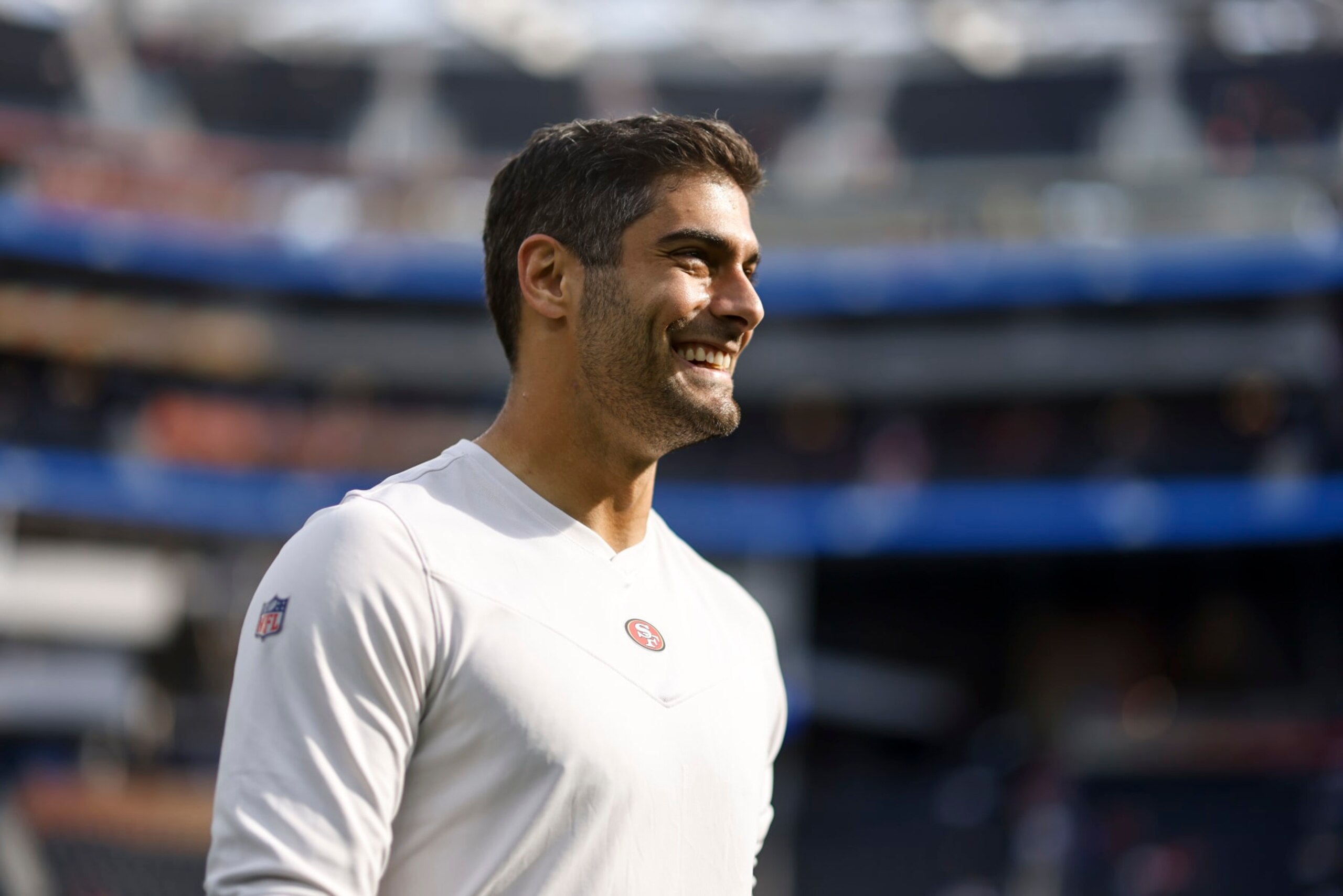 INGLEWOOD, CALIFORNIA - JANUARY 30: Jimmy Garoppolo #10 of the San Francisco 49ers reacts as he warms up prior to the NFC Championship NFL football game against the Los Angeles Rams at SoFi Stadium on January 30, 2022 in Inglewood, California. The Rams won 20-17 to advance to the Super Bowl. (Photo by Michael Owens/Getty Images)