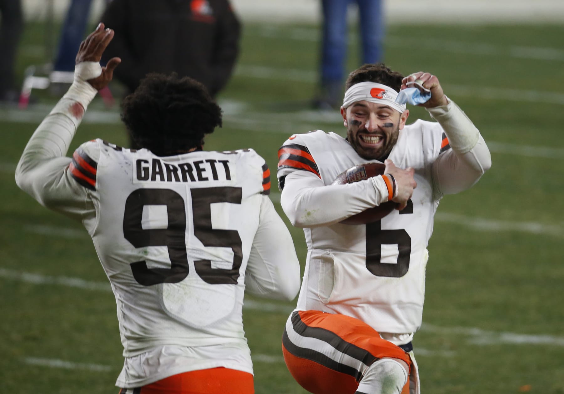 PITTSBURGH, PA - JANUARY 11:  Baker Mayfield #6 of the Cleveland Browns and Myles Garrett #95 of the Cleveland Browns celebrate against the Pittsburgh Steelers on January 11, 2021 at Heinz Field in Pittsburgh, Pennsylvania.  (Photo by Justin K. Aller/Getty Images)
