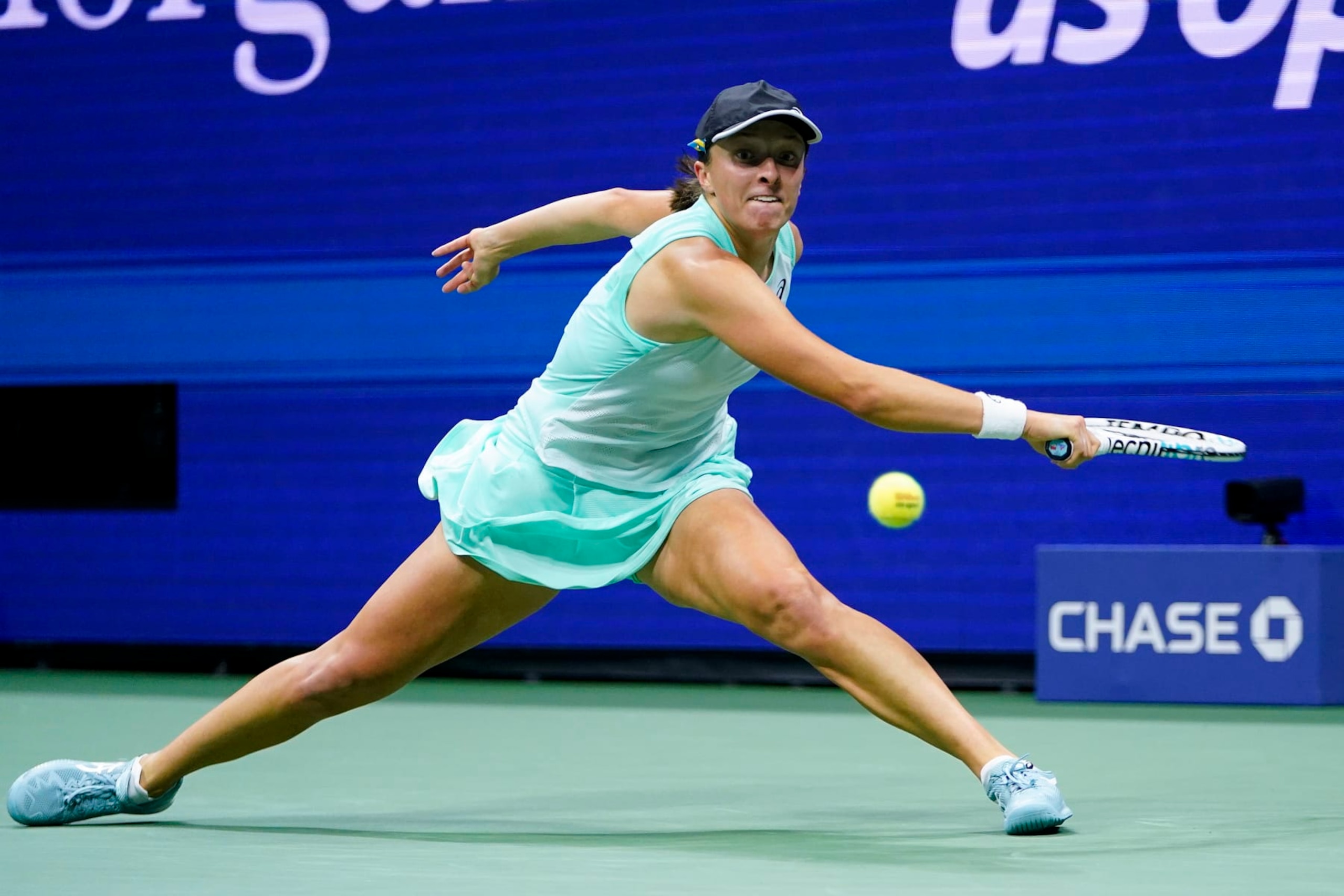 Iga Swiatek, of Poland, returns a shot to Aryna Sabalenka, of Belarus, during the semifinals of the U.S. Open tennis championships, Thursday, Sept. 8, 2022, in New York. (AP Photo/Frank Franklin II) Iga Swiatek, of Poland, returns a shot to Aryna Sabalenka, of Belarus, during the semifinals of the U.S. Open tennis championships, Thursday, Sept. 8, 2022, in New York. (AP Photo/Frank Franklin II)