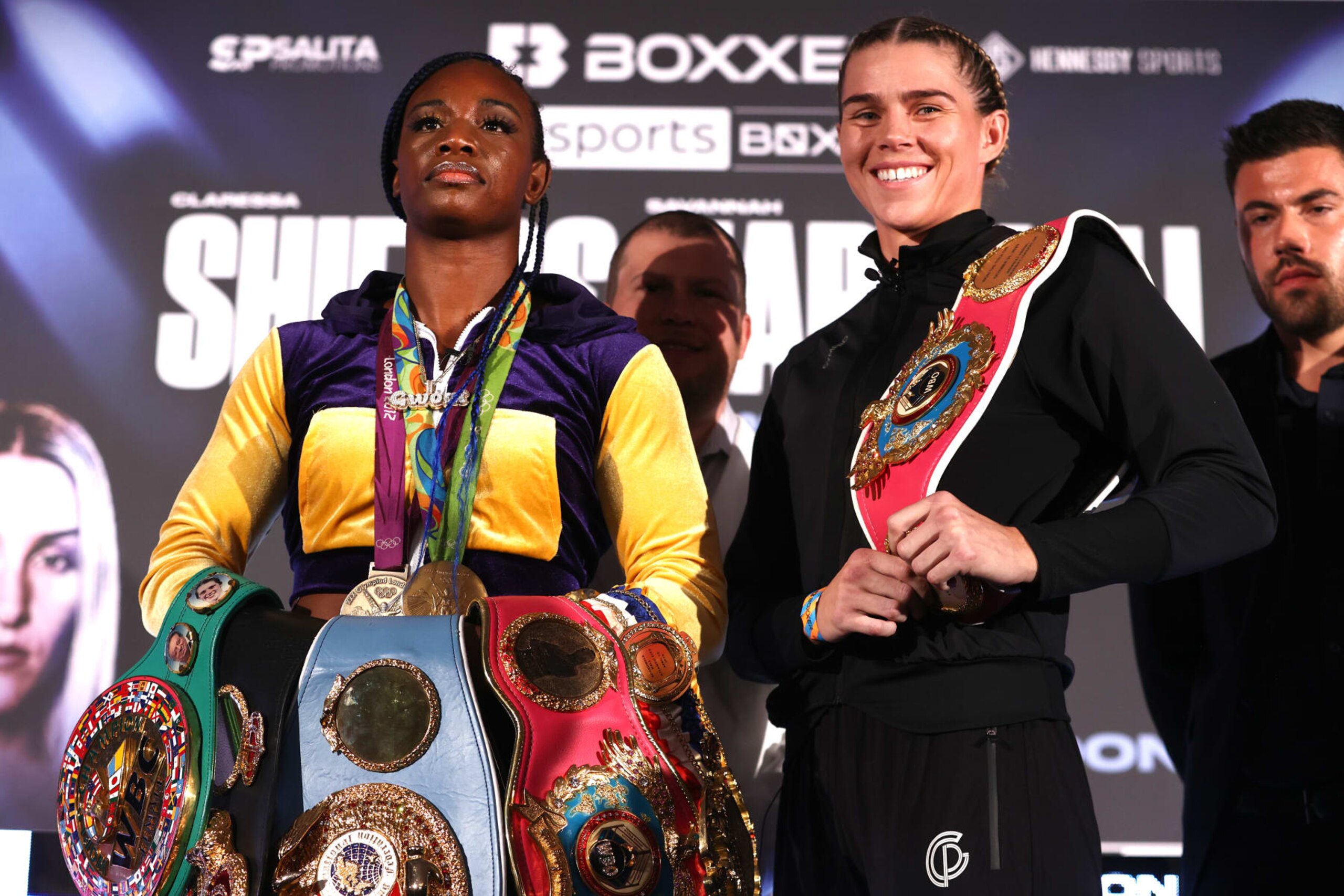 LONDON, ENGLAND - SEPTEMBER 08: Claressa Shields (L) and Savannah Marshall (R) pose during the press conference ahead of their undisputed middleweight championship fight at Canary Riverside Plaza Hotel on September 08, 2022 in London, England. (Photo by Mikey Williams/Top Rank Inc via Getty Images)