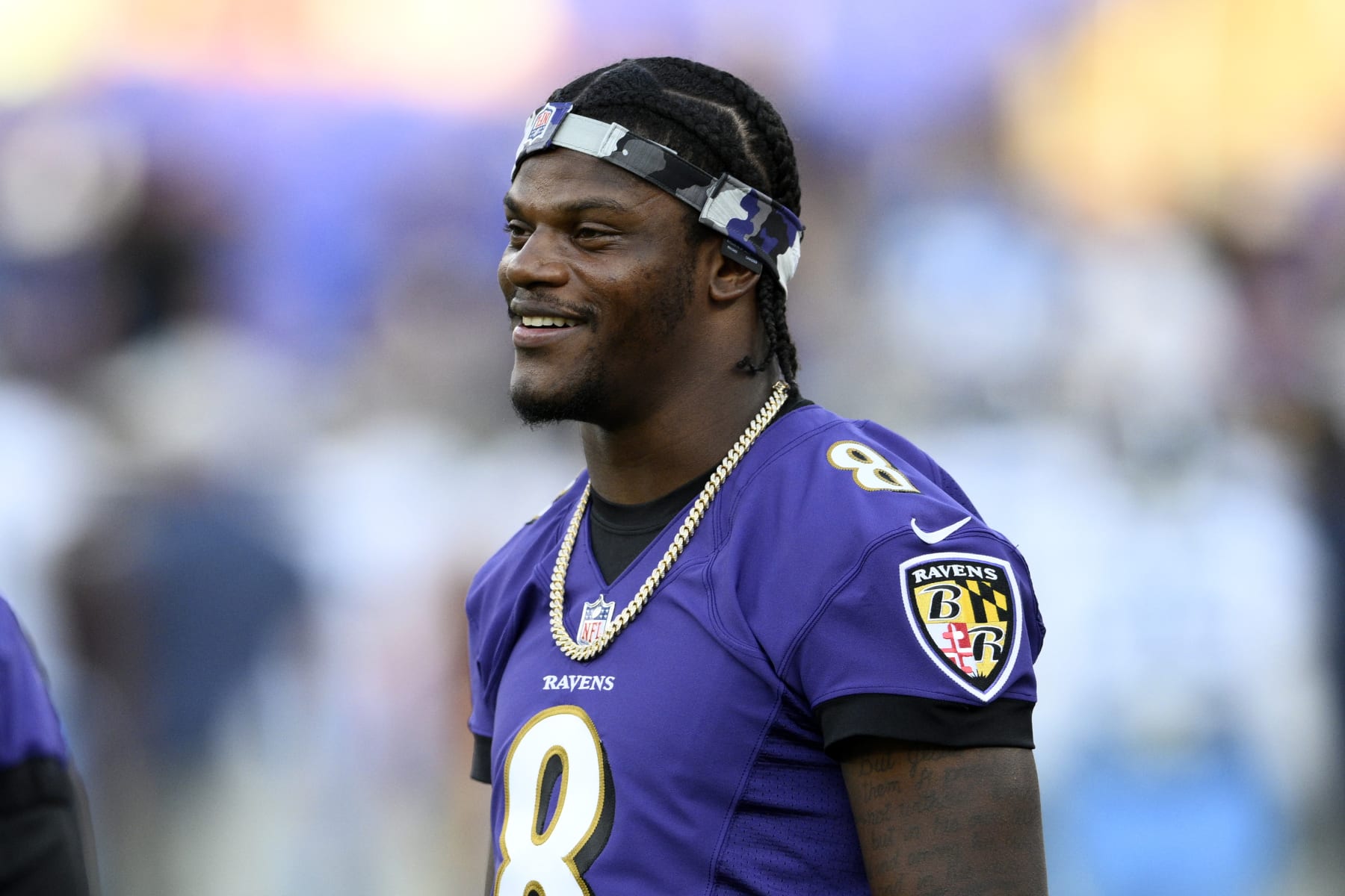 Baltimore Ravens quarterback Lamar Jackson (8) looks on prior to an preseason NFL football game against the Tennessee Titans, Thursday, Aug. 11, 2022, in Baltimore. (AP Photo/Nick Wass)