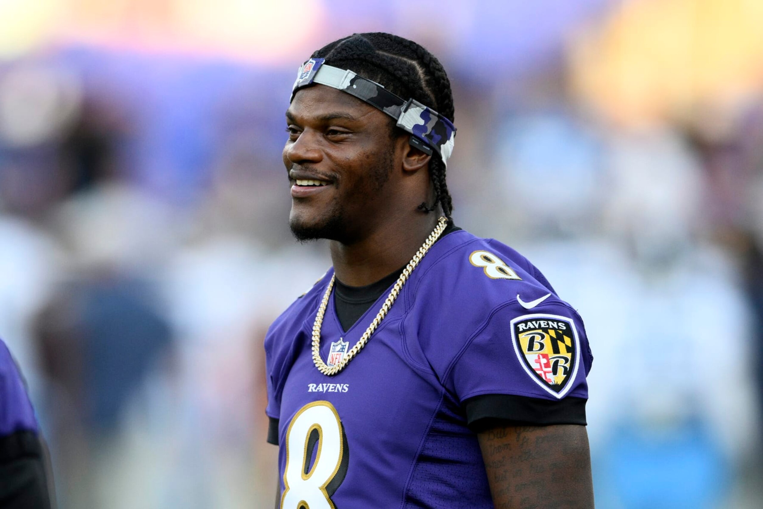 Baltimore Ravens quarterback Lamar Jackson (8) looks on prior to an preseason NFL football game against the Tennessee Titans, Thursday, Aug. 11, 2022, in Baltimore. (AP Photo/Nick Wass)