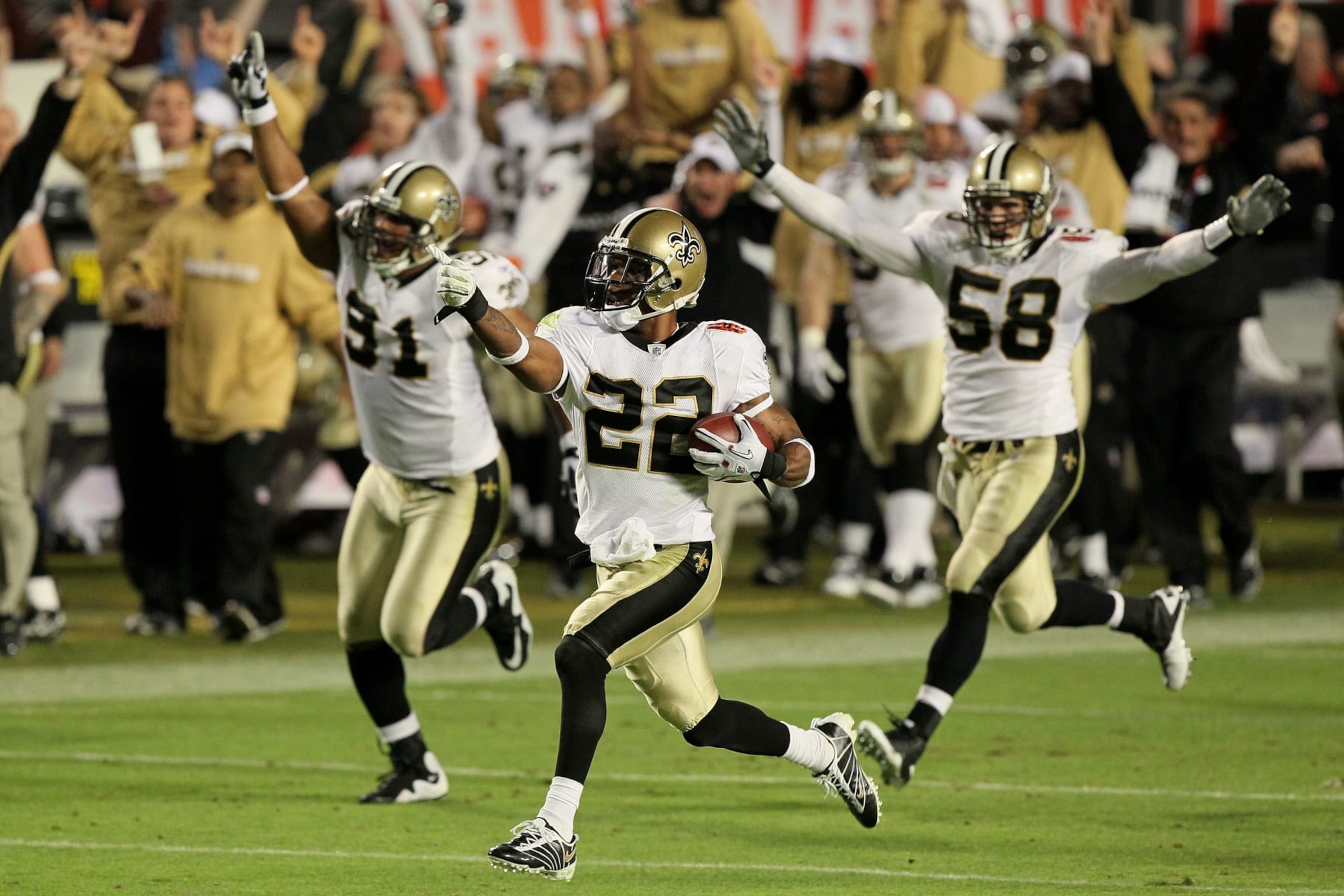 MIAMI GARDENS, FL - FEBRUARY 07:  Tracy Porter #22 of the New Orleans Saints intercepts Peyton Manning #18 of the Indianapolis Colts for a touchdown in the fourth quarter during Super Bowl XLIV on February 7, 2010 at Sun Life Stadium in Miami Gardens, Florida.  (Photo by Jed Jacobsohn/Getty Images)
