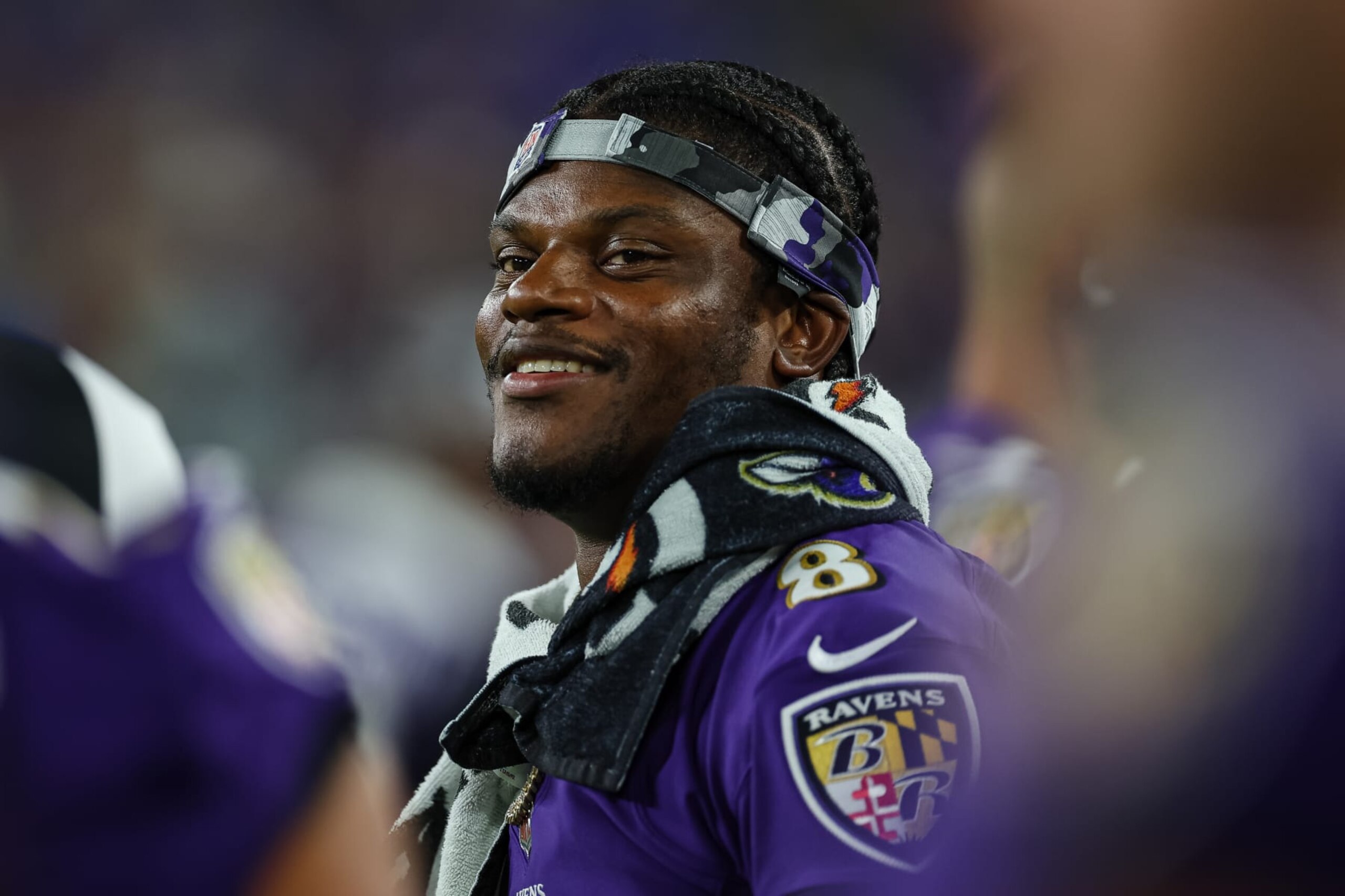 BALTIMORE, MD - AUGUST 11: Lamar Jackson #8 of the Baltimore Ravens looks on against the Tennessee Titans during the second half at M&T Bank Stadium on August 11, 2022 in Baltimore, Maryland. (Photo by Scott Taetsch/Getty Images)