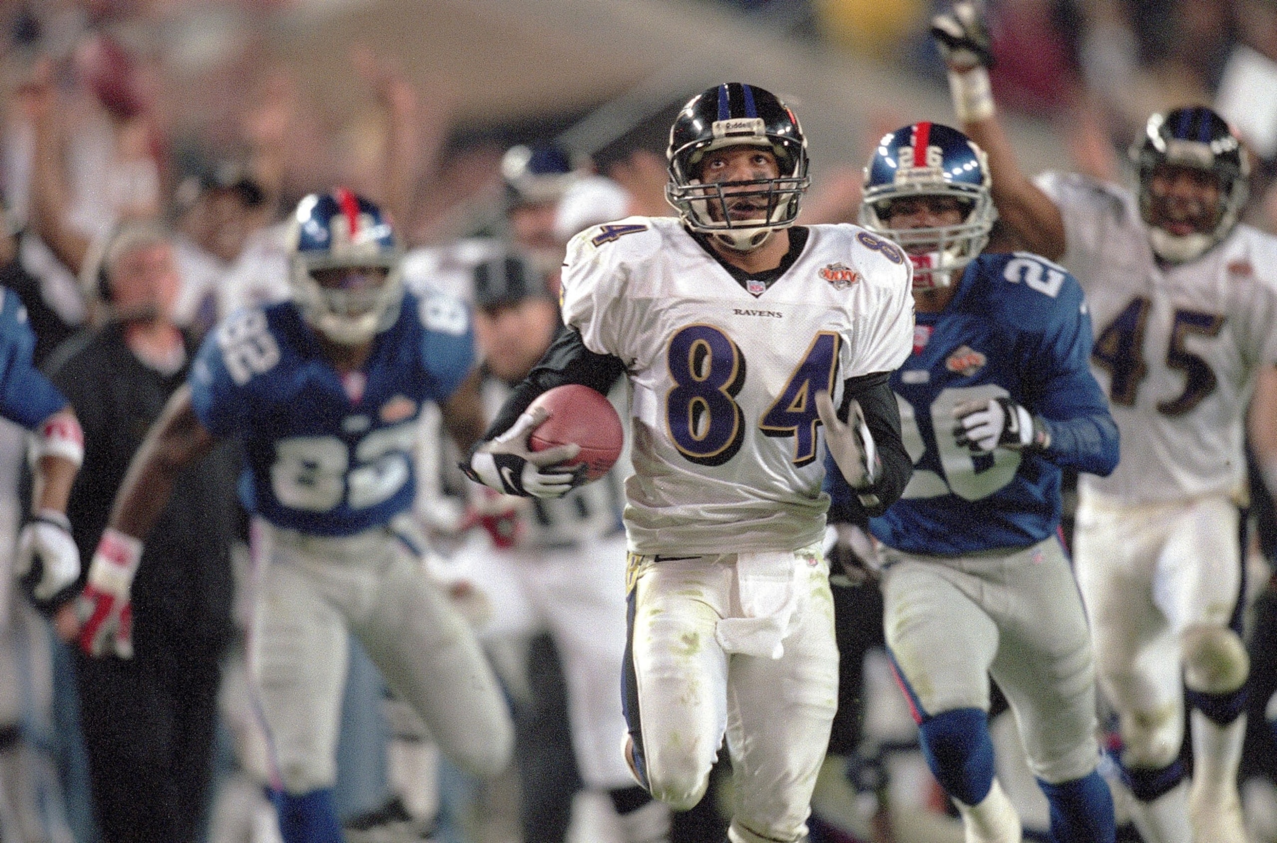 UNITED STATES - JANUARY 28:  Football: Super Bowl XXXV, Baltimore Ravens Jermaine Lewis (84) in action, scoring TD after kickoff return vs New York Giants, Tampa, FL 1/28/2001  (Photo by Peter Read Miller/Sports Illustrated via Getty Images)  (SetNumber: X62358 TK3 R8 F36)