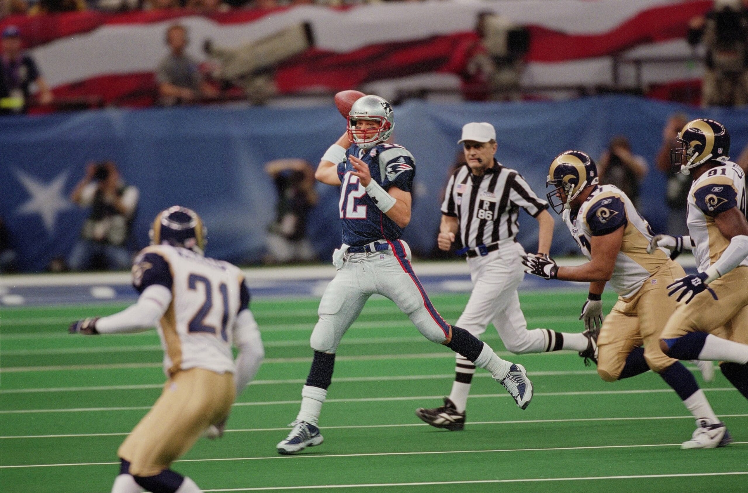 Football: Super Bowl XXXVI: New England Patriots QB Tom Brady (12) in action, making pass vs St. Louis Rams at Louisiana Superdome.
New Orleans, LA 2/3/2002
CREDIT: David E. Klutho (Photo by David E. Klutho /Sports Illustrated via Getty Images)
(Set Number: X65094 TK2 R3 F31 )