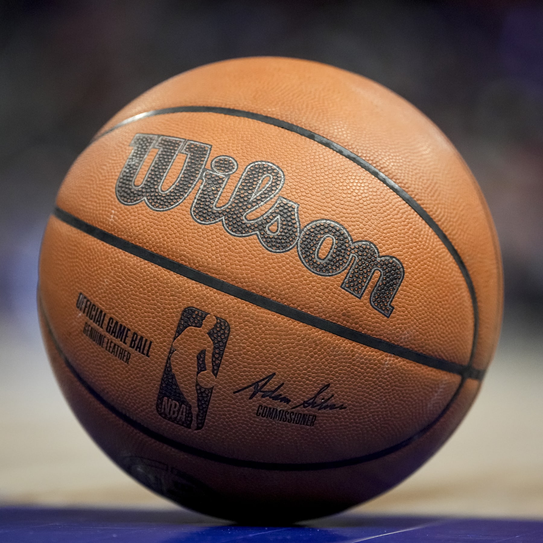 DETROIT, MICHIGAN - MARCH 31: The NBA logo is pictured on a Wilson brand basketball during the game between the Detroit Pistons and Philadelphia 76ers Little Caesars Arena on March 31, 2022 in Detroit, Michigan. NOTE TO USER: User expressly acknowledges and agrees that, by downloading and or using this photograph, User is consenting to the terms and conditions of the Getty Images License Agreement. (Photo by Nic Antaya/Getty Images)
