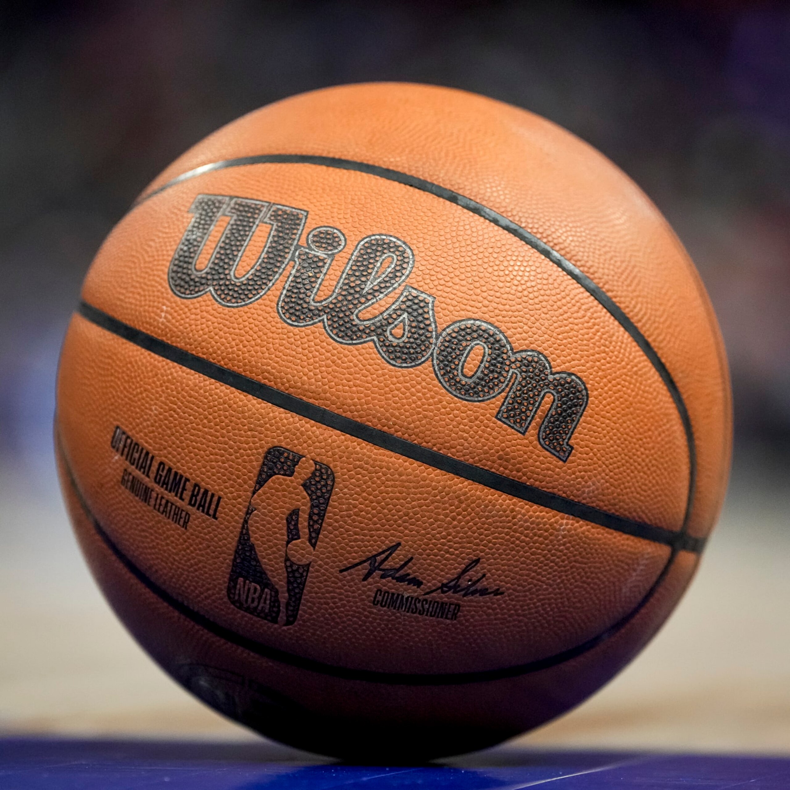 DETROIT, MICHIGAN - MARCH 31: The NBA logo is pictured on a Wilson brand basketball during the game between the Detroit Pistons and Philadelphia 76ers Little Caesars Arena on March 31, 2022 in Detroit, Michigan. NOTE TO USER: User expressly acknowledges and agrees that, by downloading and or using this photograph, User is consenting to the terms and conditions of the Getty Images License Agreement. (Photo by Nic Antaya/Getty Images)