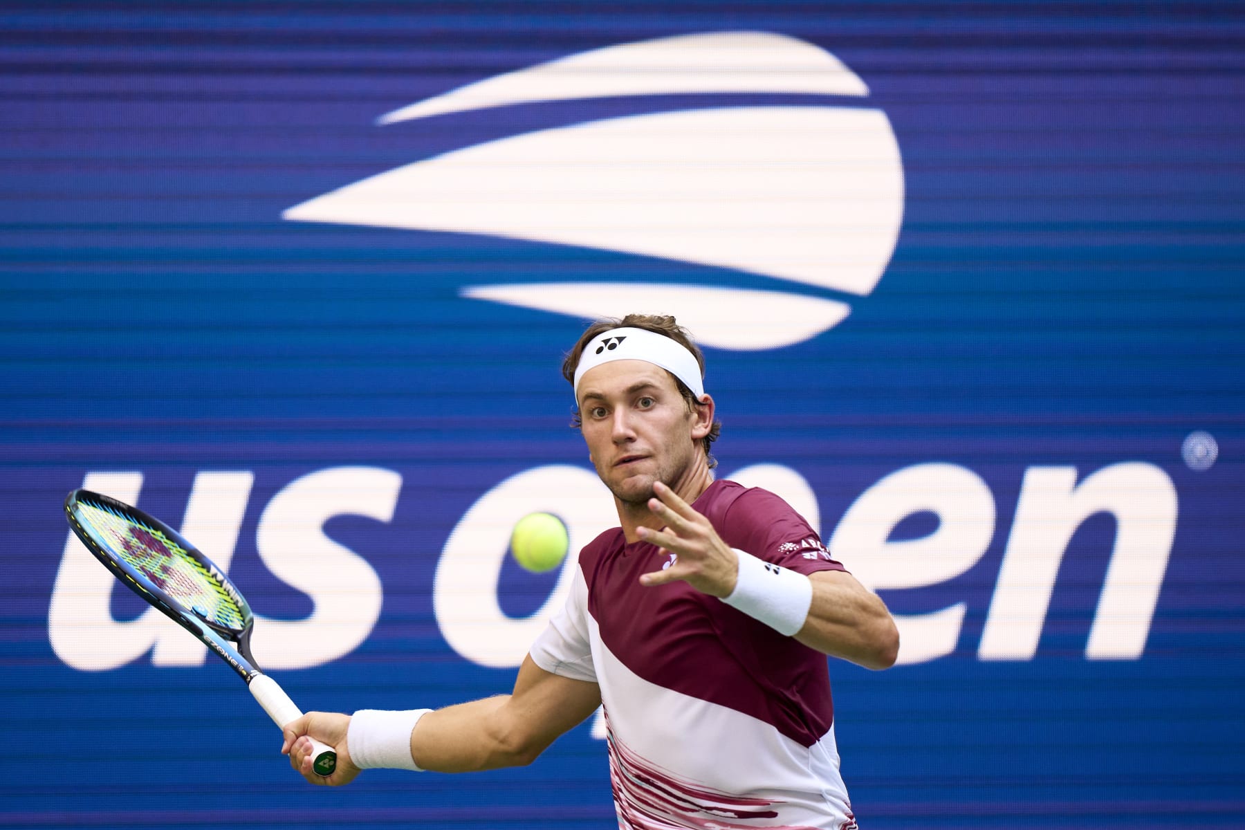 NEW YORK, NEW YORK - SEPTEMBER 09: Casper Ruud of Norway  looks to return a ball against against Karen Khachanov during their Men’s Singles Semifinal match on Day Twelve of the 2022 US Open at USTA Billie Jean King National Tennis Center on September 09, 2022 in the Flushing neighborhood of the Queens borough of New York City.  (Photo by Diego Souto/Quality Sport Images/Getty Images)