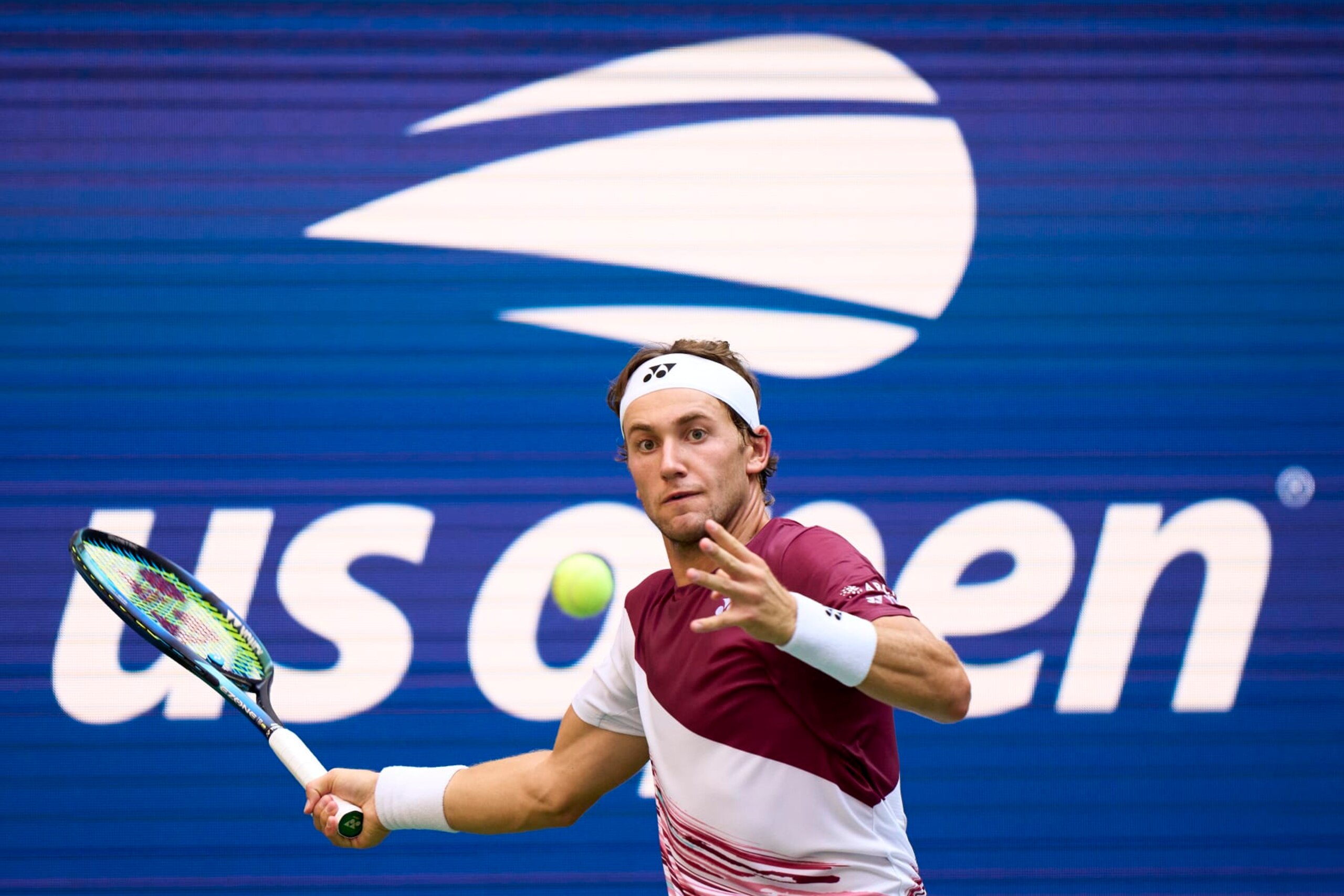 NEW YORK, NEW YORK - SEPTEMBER 09: Casper Ruud of Norway  looks to return a ball against against Karen Khachanov during their Men’s Singles Semifinal match on Day Twelve of the 2022 US Open at USTA Billie Jean King National Tennis Center on September 09, 2022 in the Flushing neighborhood of the Queens borough of New York City.  (Photo by Diego Souto/Quality Sport Images/Getty Images)