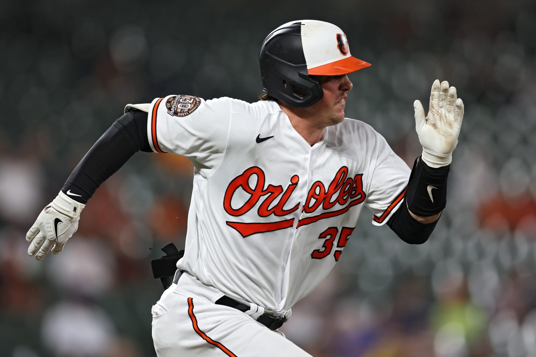 BALTIMORE, MARYLAND - SEPTEMBER 07: Adley Rutschman #35 of the Baltimore Orioles runs to first base before being called out against the Toronto Blue Jays during the third inning at Oriole Park at Camden Yards on September 07, 2022 in Baltimore, Maryland. (Photo by Patrick Smith/Getty Images)