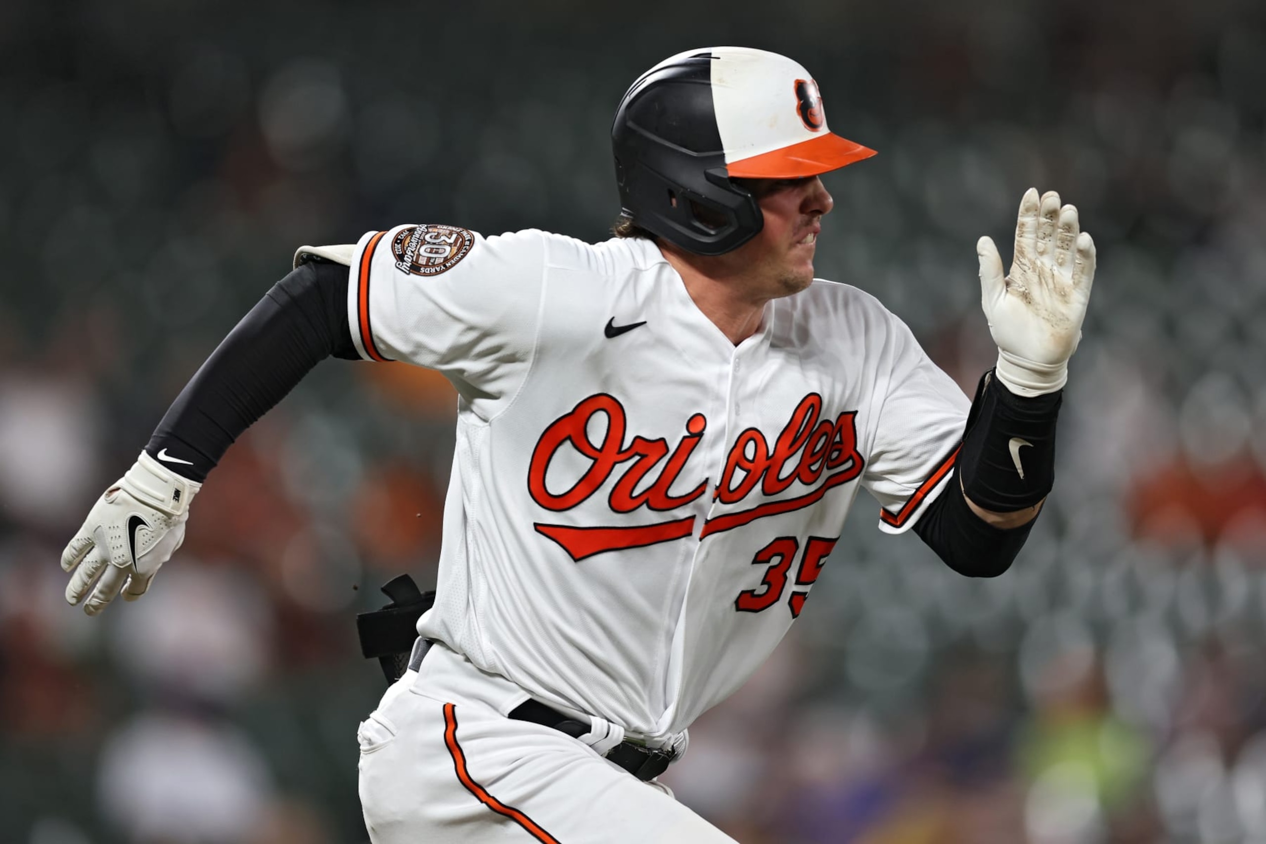 BALTIMORE, MARYLAND - SEPTEMBER 07: Adley Rutschman #35 of the Baltimore Orioles runs to first base before being called out against the Toronto Blue Jays during the third inning at Oriole Park at Camden Yards on September 07, 2022 in Baltimore, Maryland. (Photo by Patrick Smith/Getty Images)