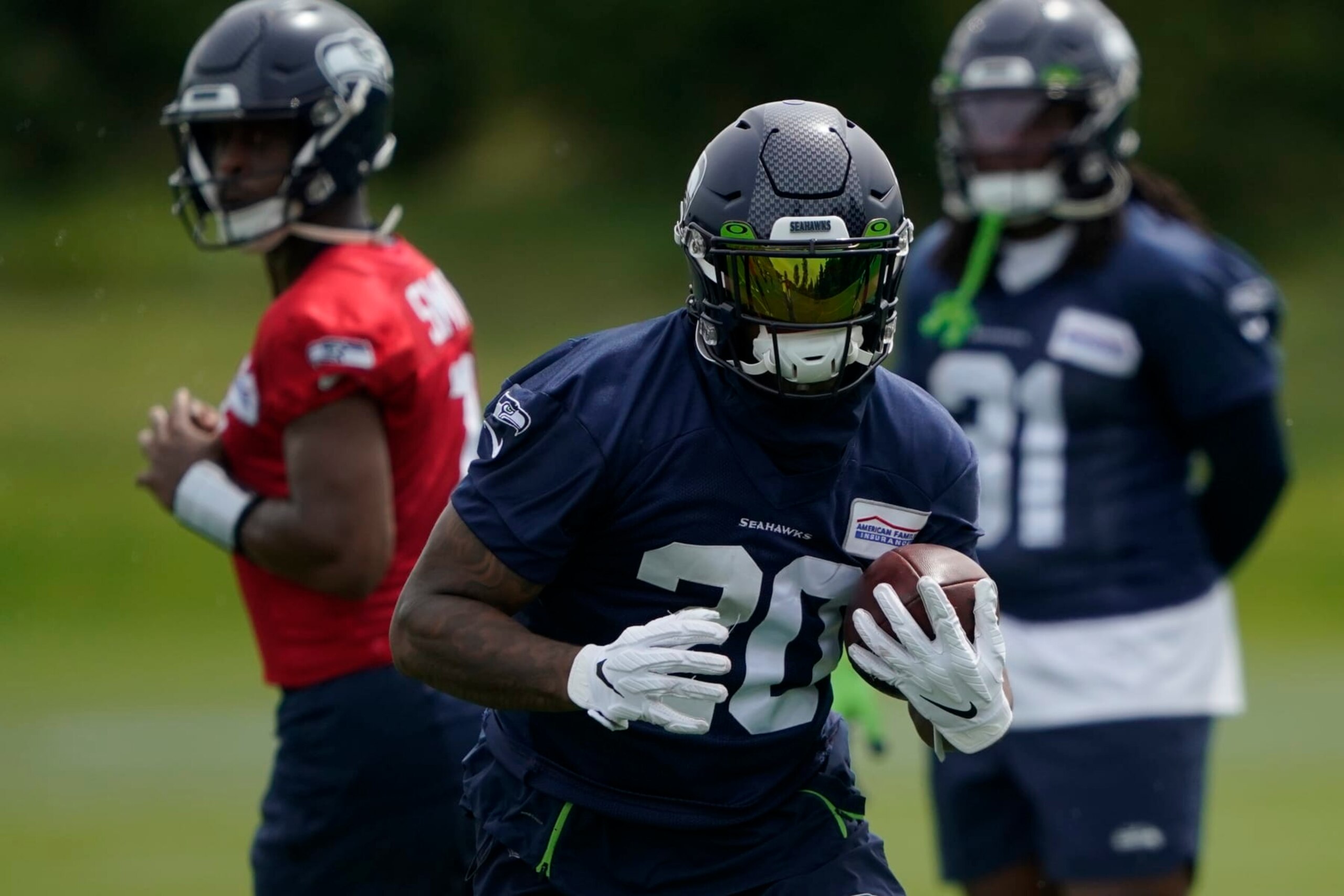 Seattle Seahawks running back Rashaad Penny runs a drill during NFL football practice Wednesday, June 8, 2022, in Renton, Wash. (AP Photo/Ted S. Warren)