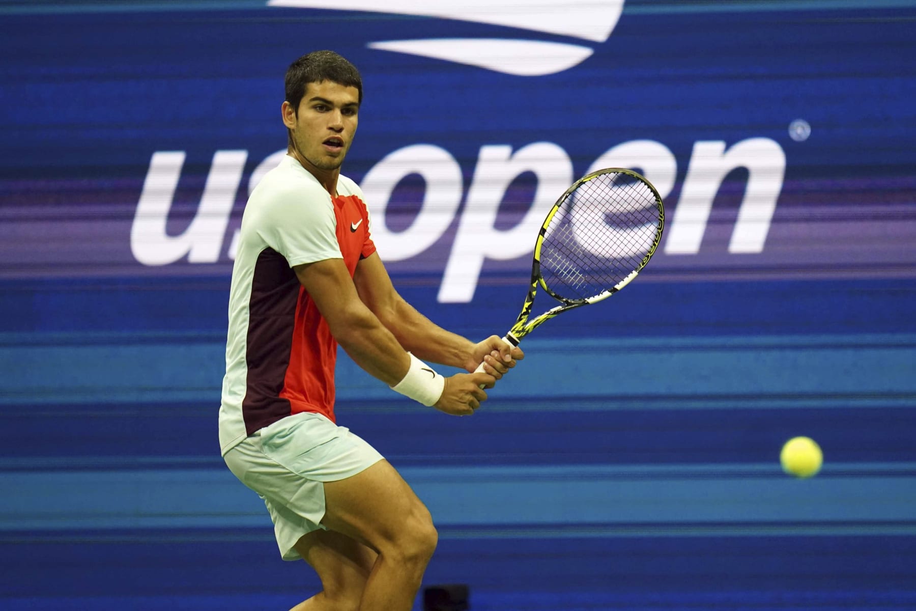 Carlos Alcaraz of Spain receives the serve from Frances Tiafoe of the United States in the semi-finals of the U.S. Open tennis tournament, Friday. Sept. 9, 2022, in New York. (AP Photo/Vera Nieuwenhuis)