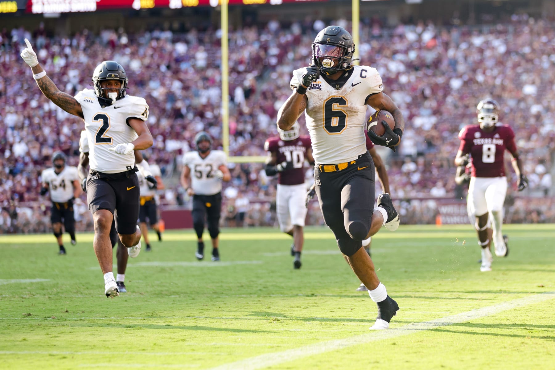 COLLEGE STATION, TEXAS - SEPTEMBER 10: Camerun Peoples #6 of the Appalachian State Mountaineers rushes for a touchdown during the second half against the Texas A&M Aggies at Kyle Field on September 10, 2022 in College Station, Texas. (Photo by Carmen Mandato/Getty Images)