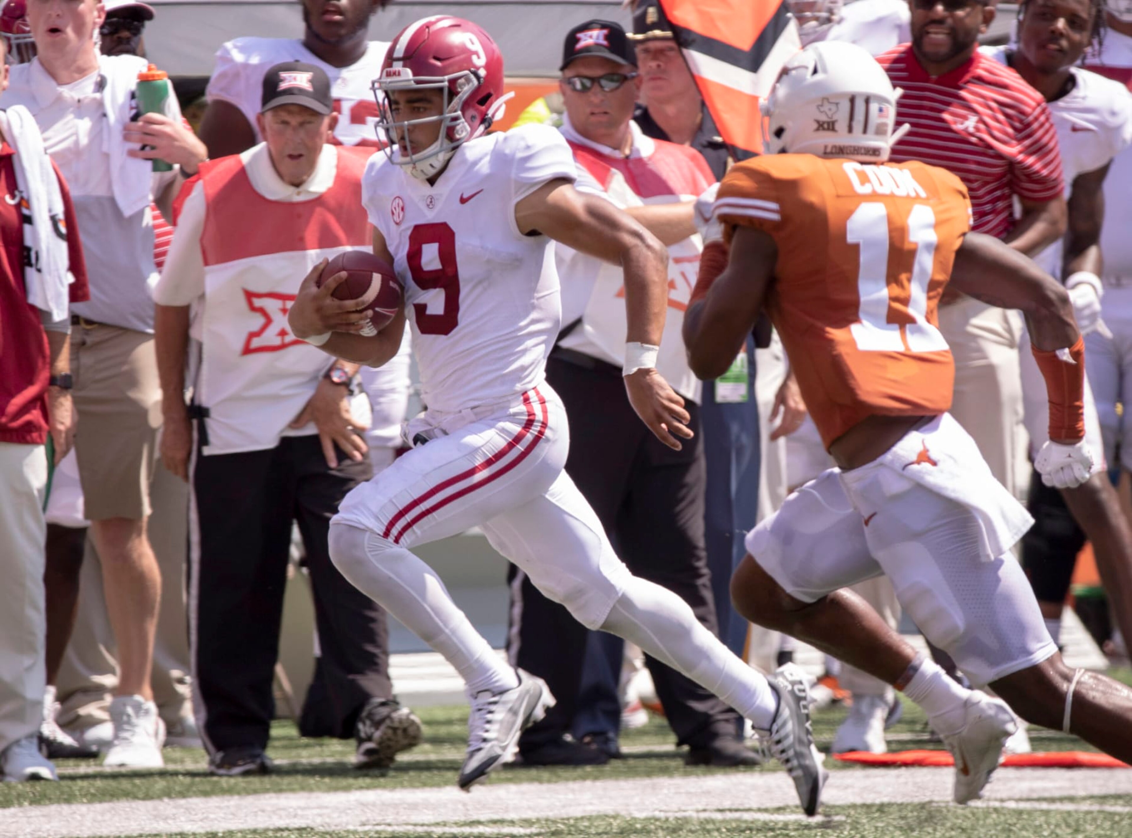 Alabama quarterback Bryce Young (9) is chased out of bounds by Texas defensive back Anthony Cook during the second half of an NCAA college football game, Saturday, Sept. 10, 2022, in Austin, Texas. Alabama defeated Texas 20-19. (AP Photo/Rodolfo Gonzalez)