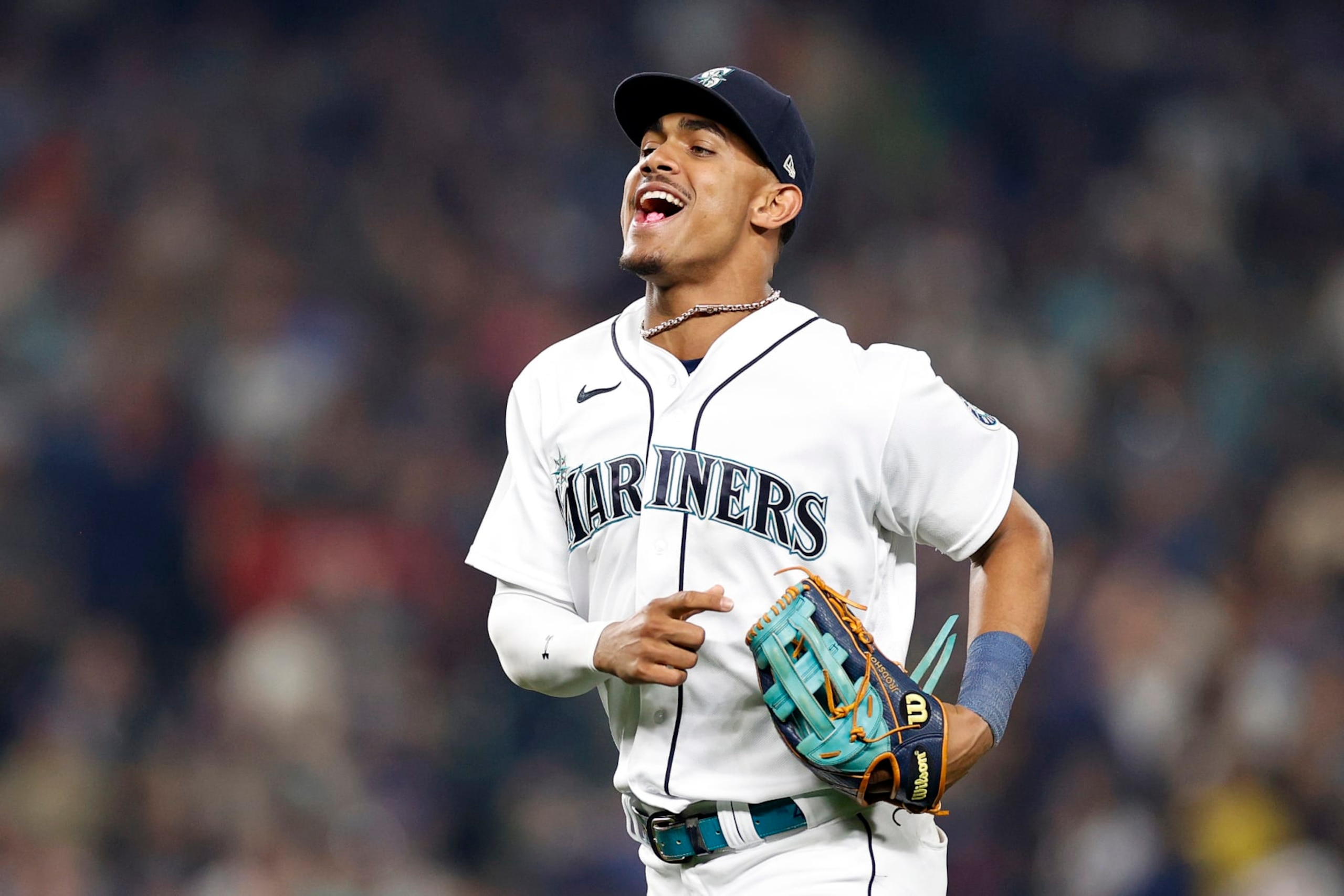 SEATTLE, WASHINGTON - SEPTEMBER 10: Julio Rodriguez #44 of the Seattle Mariners reacts after beating the against the Atlanta Braves 3-1 at T-Mobile Park on September 10, 2022 in Seattle, Washington. (Photo by Steph Chambers/Getty Images)
