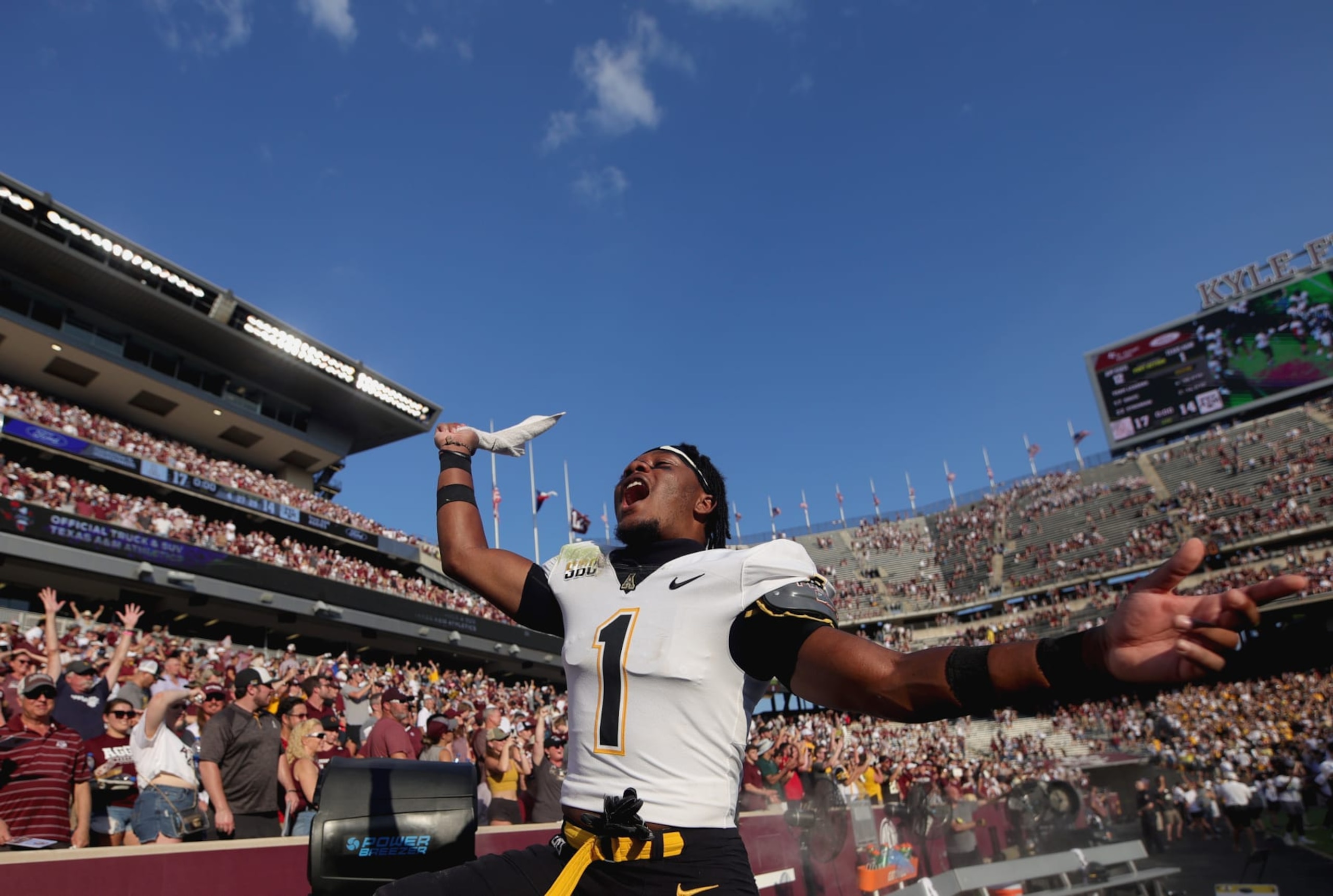 COLLEGE STATION, TEXAS - SEPTEMBER 10: Kaleb Dawson of the Appalachian State Mountaineers celebrates defeating the Texas A&M Aggies 17-14 at Kyle Field on September 10, 2022 in College Station, Texas. (Photo by Carmen Mandato/Getty Images)