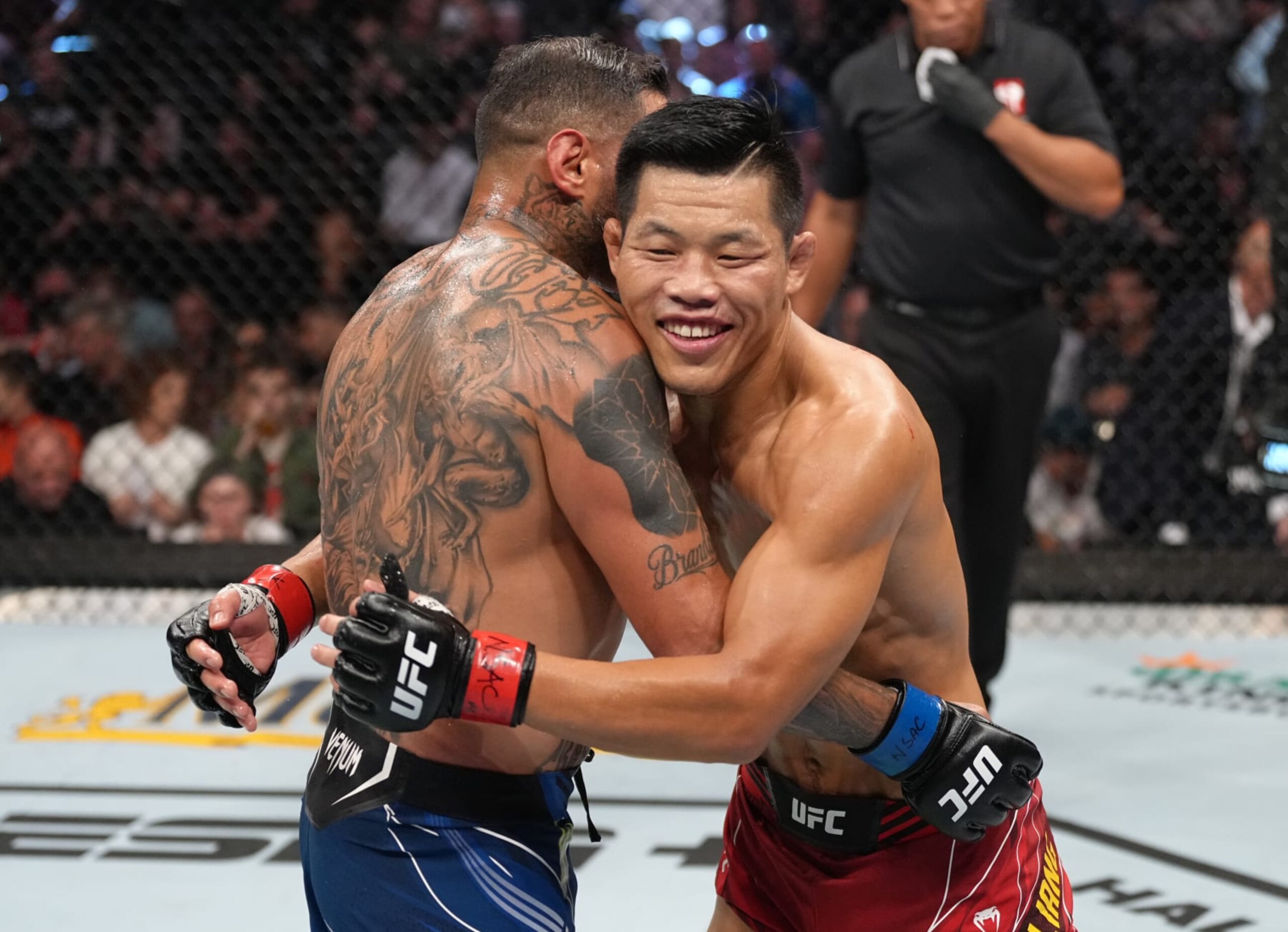 LAS VEGAS, NEVADA - SEPTEMBER 10: (L-R) Daniel Rodriguez and Li Jingliang of China talk after the conclusion of their 180-pound catchweight fight during the UFC 279 event at T-Mobile Arena on September 10, 2022 in Las Vegas, Nevada. (Photo by Jeff Bottari/Zuffa LLC) LAS VEGAS, NEVADA - SEPTEMBER 10: (L-R) Daniel Rodriguez and Li Jingliang of China talk after the conclusion of their 180-pound catchweight fight during the UFC 279 event at T-Mobile Arena on September 10, 2022 in Las Vegas, Nevada. (Photo by Jeff Bottari/Zuffa LLC)