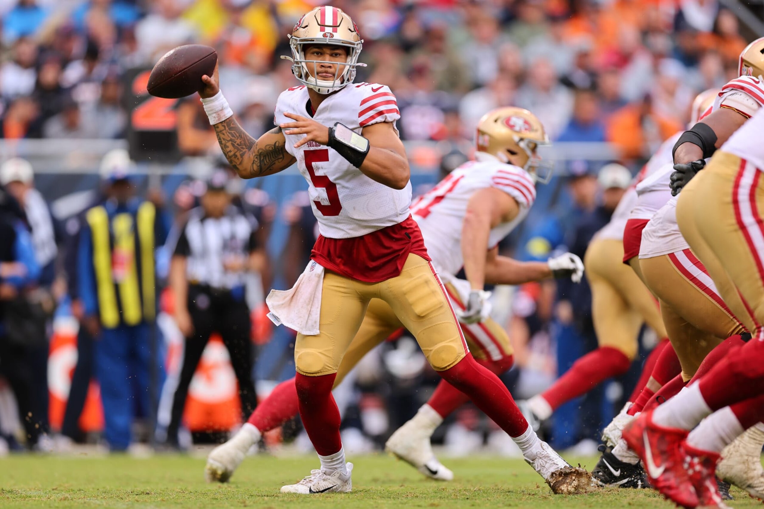 CHICAGO, ILLINOIS - SEPTEMBER 11: Quarterback Trey Lance #5 of the San Francisco 49ers attempts a pass during the first half against the Chicago Bears at Soldier Field on September 11, 2022 in Chicago, Illinois. (Photo by Michael Reaves/Getty Images)