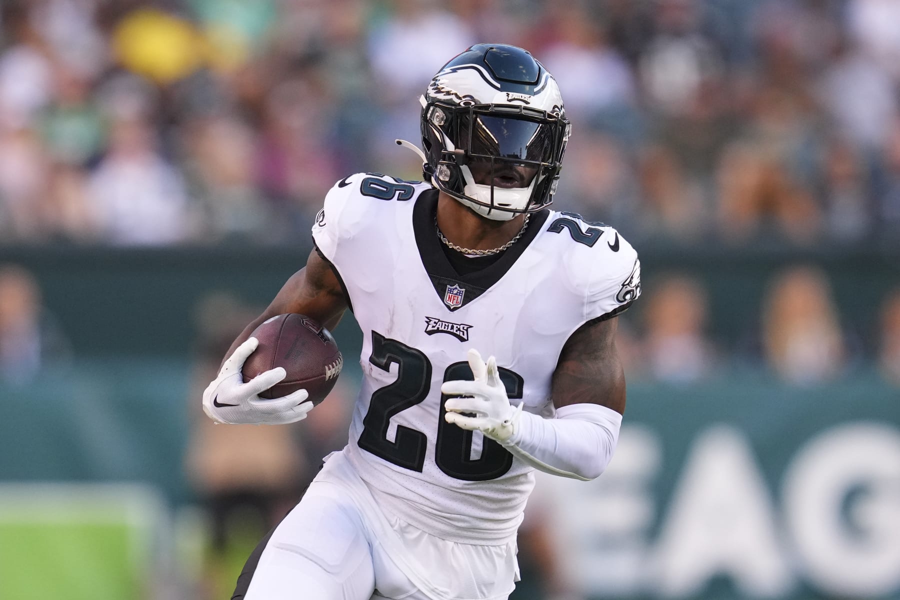 PHILADELPHIA, PA - AUGUST 12: Miles Sanders #26 of the Philadelphia Eagles runs with the ball against the New York Jets during the preseason game at Lincoln Financial Field on August 12, 2022 in Philadelphia, Pennsylvania. The Jets defeated the Eagles 24-21. (Photo by Mitchell Leff/Getty Images)