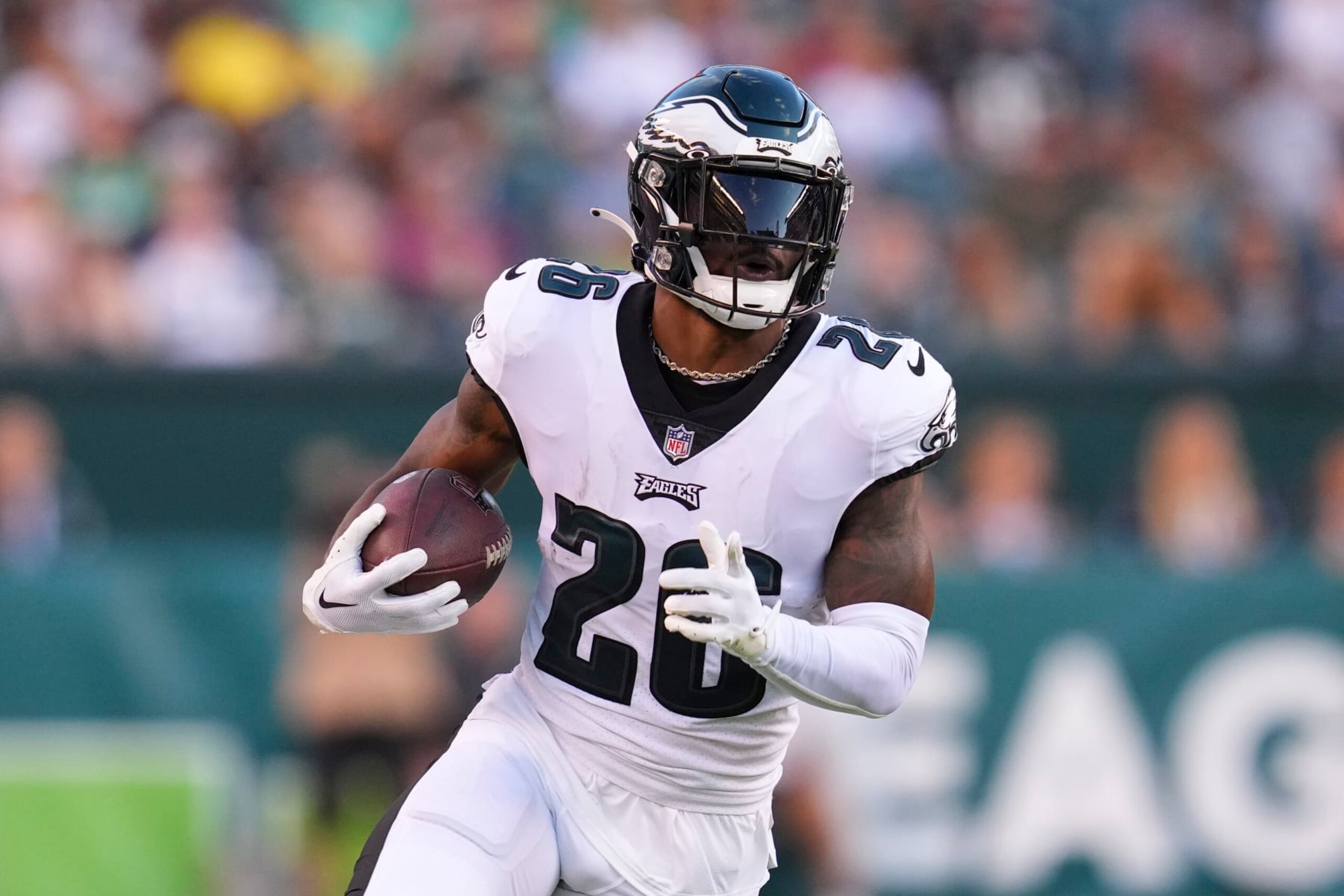 PHILADELPHIA, PA - AUGUST 12: Miles Sanders #26 of the Philadelphia Eagles runs with the ball against the New York Jets during the preseason game at Lincoln Financial Field on August 12, 2022 in Philadelphia, Pennsylvania. The Jets defeated the Eagles 24-21. (Photo by Mitchell Leff/Getty Images)