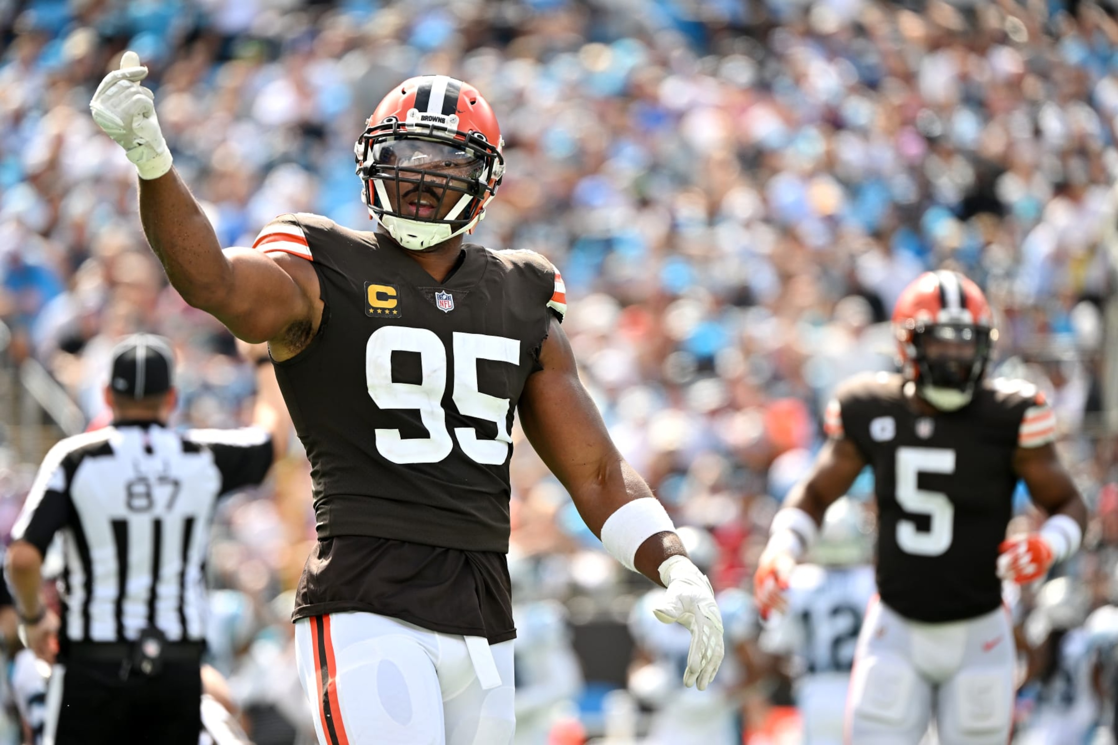 CHARLOTTE, NORTH CAROLINA - SEPTEMBER 11: Myles Garrett #95 of the Cleveland Browns reacts after sacking Baker Mayfield #6 of the Carolina Panthers (not pictured) during the third quarter at Bank of America Stadium on September 11, 2022 in Charlotte, North Carolina. (Photo by Grant Halverson/Getty Images)