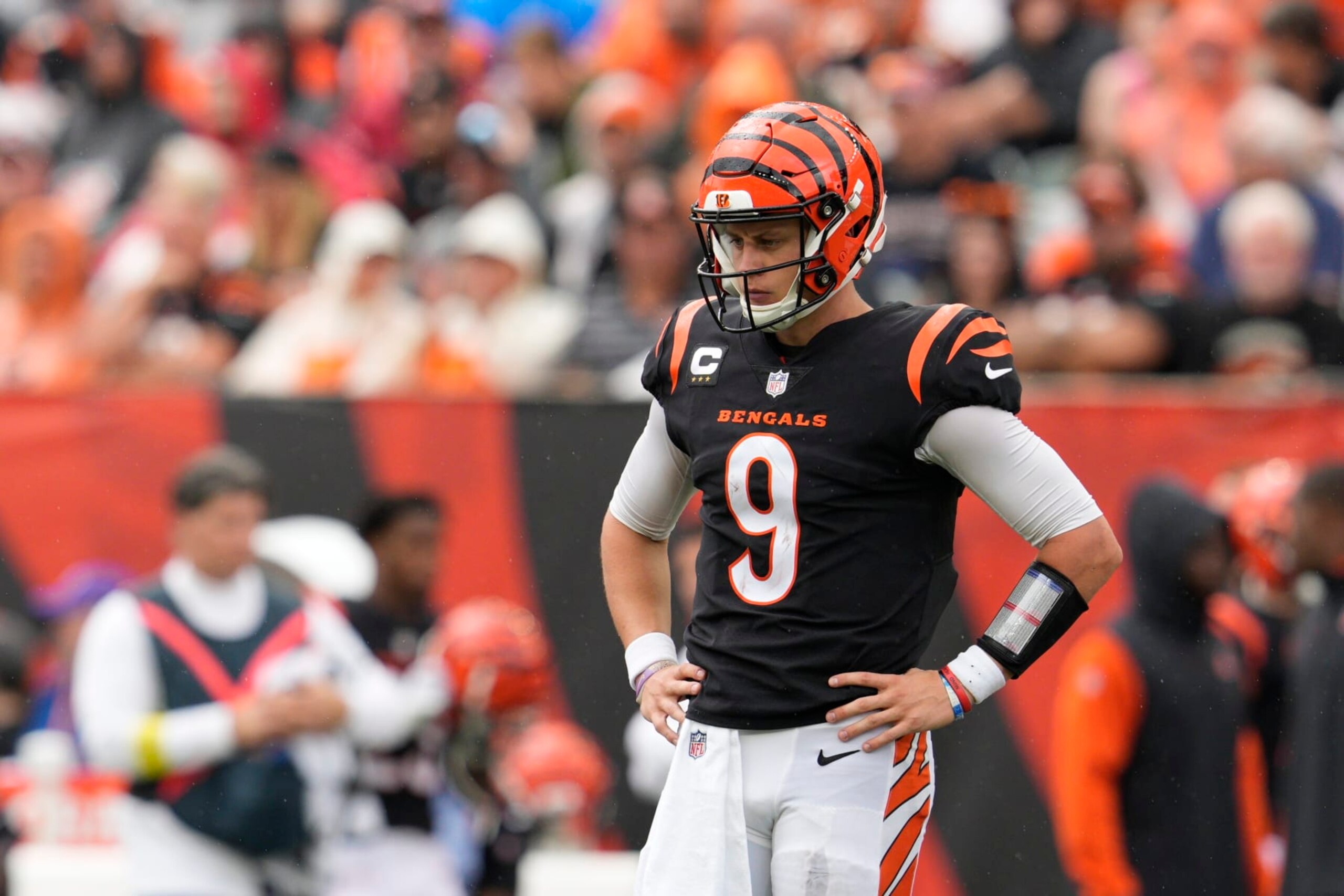 Cincinnati Bengals quarterback Joe Burrow (9) pauses during the first half of an NFL football game against the Pittsburgh Steelers, Sunday, Sept. 11, 2022, in Cincinnati. (AP Photo/Jeff Dean)