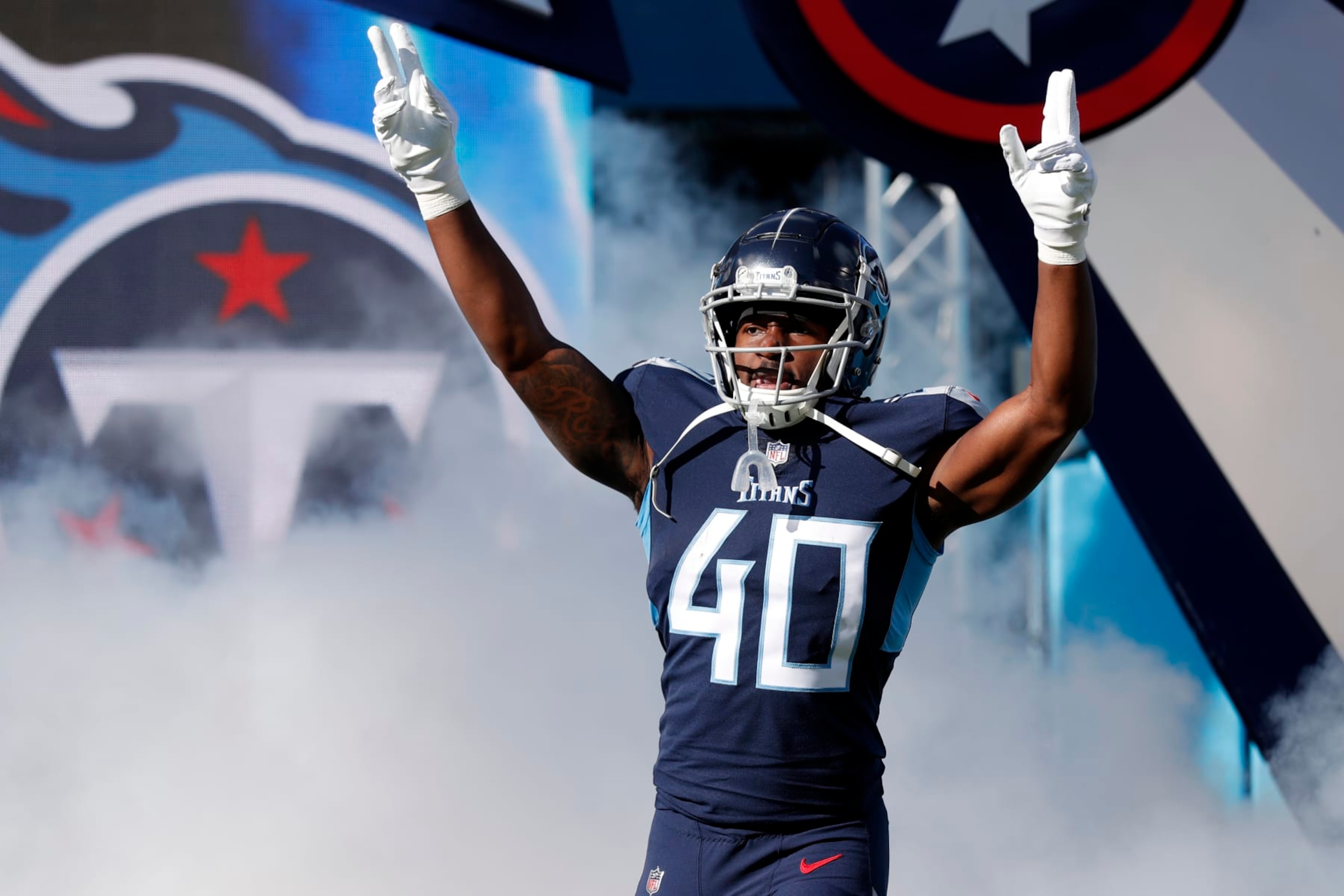 NASHVILLE, TENNESSEE - DECEMBER 12: Dontrell Hilliard #40 of the Tennessee Titans reacts as he is introduced prior to the game against the Jacksonville Jaguars at Nissan Stadium on December 12, 2021 in Nashville, Tennessee. (Photo by Wesley Hitt/Getty Images)