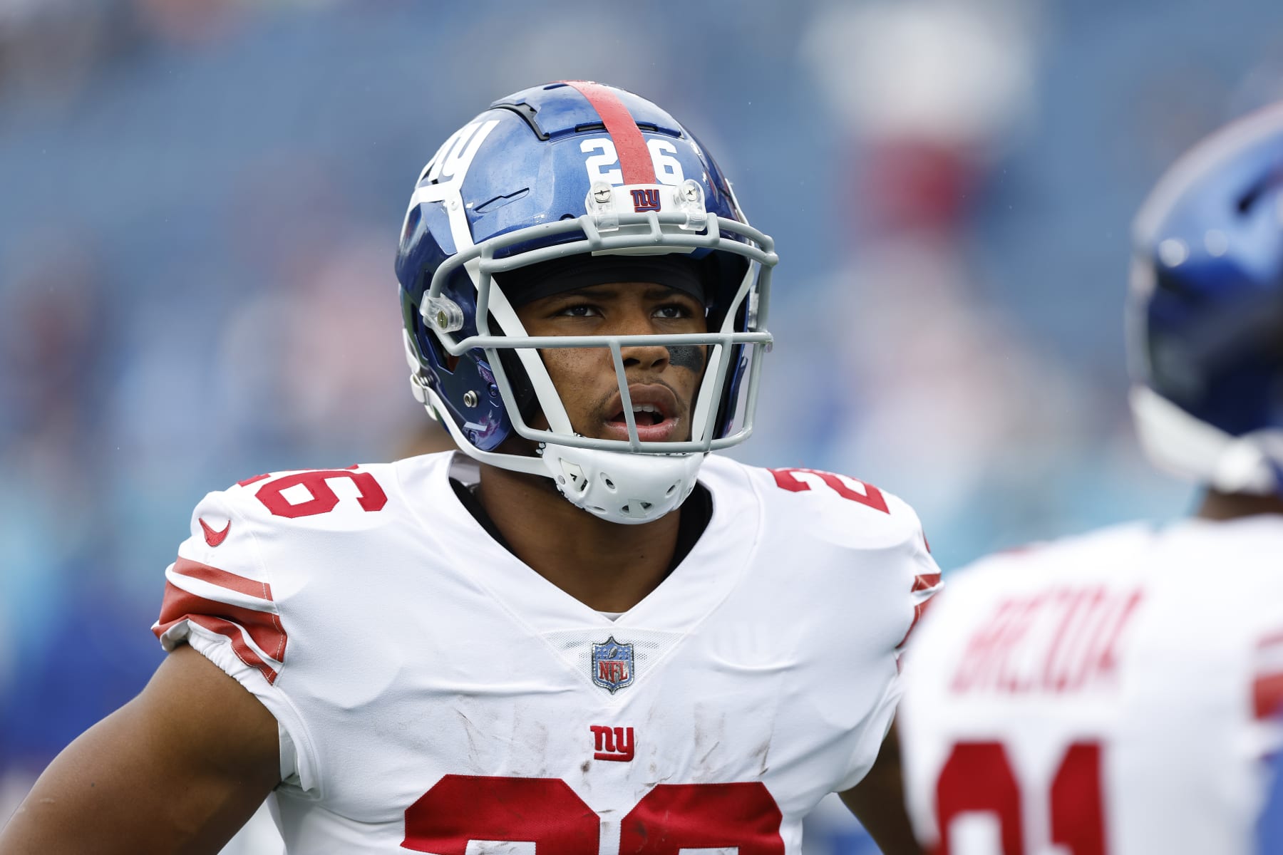 NASHVILLE, TENNESSEE - SEPTEMBER 11: Running back Saquon Barkley #26 of the New York Giants warms up before his team's game against the Tennessee Titans at Nissan Stadium on September 11, 2022 in Nashville, Tennessee. (Photo by Wesley Hitt/Getty Images)