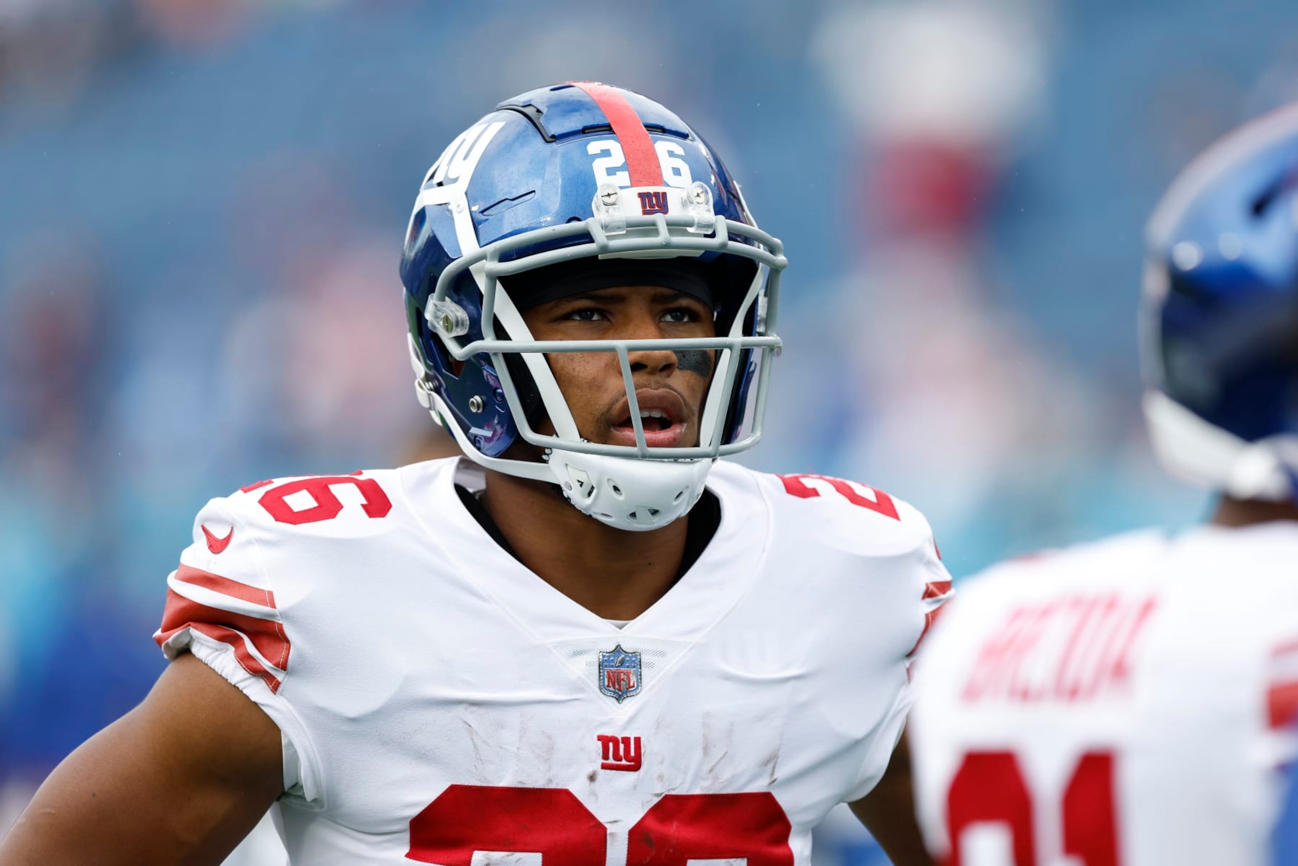 NASHVILLE, TENNESSEE - SEPTEMBER 11: Running back Saquon Barkley #26 of the New York Giants warms up before his team's game against the Tennessee Titans at Nissan Stadium on September 11, 2022 in Nashville, Tennessee. (Photo by Wesley Hitt/Getty Images)