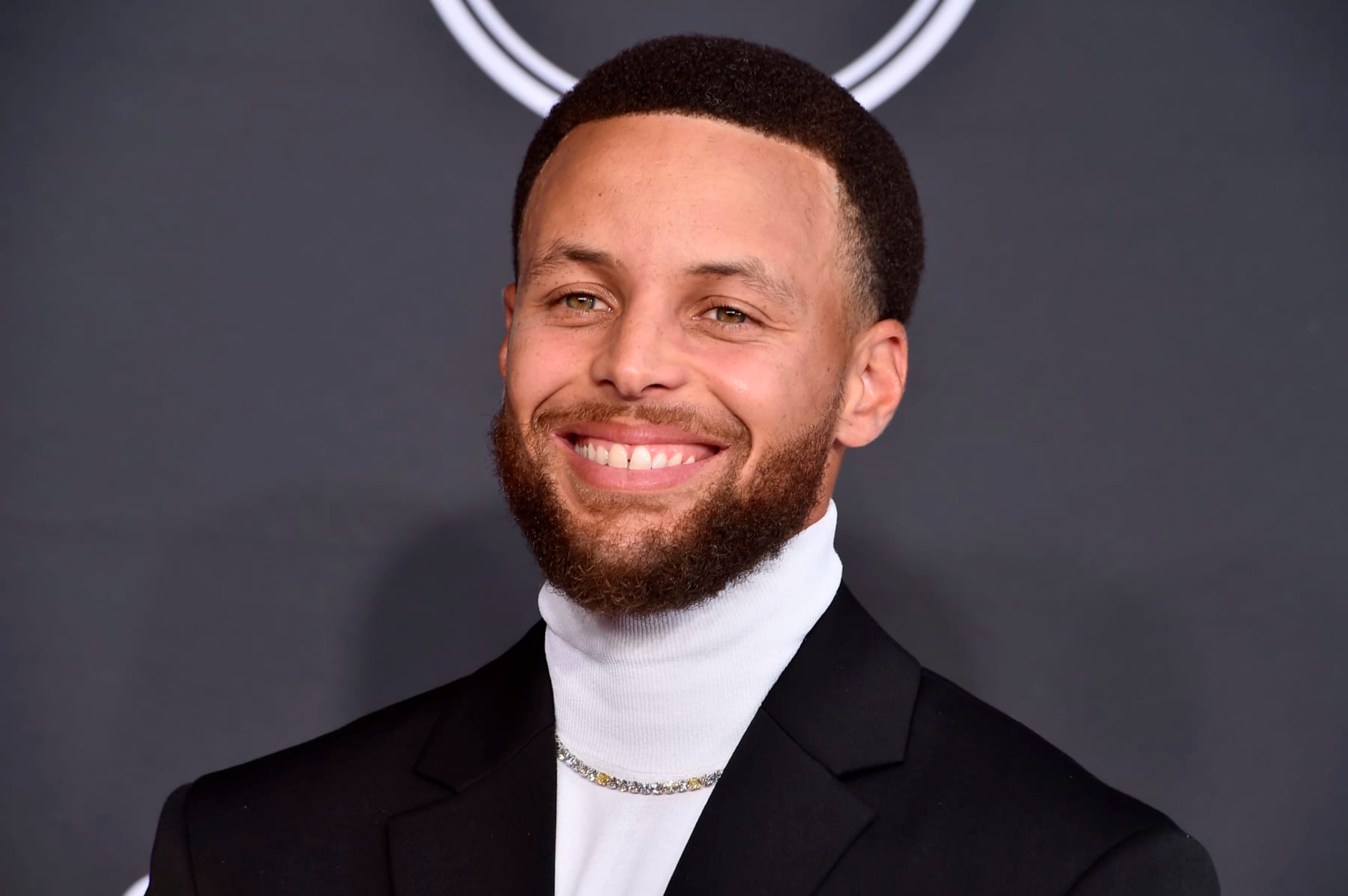 FILE - NBA basketball player Stephen Curry, of the Golden State Warriors, arrives at the ESPY Awards in Los Angeles on July 20, 2022. Curry has a new children's book "I Have a Superpower.” (Photo by Jordan Strauss/Invision/AP, File)