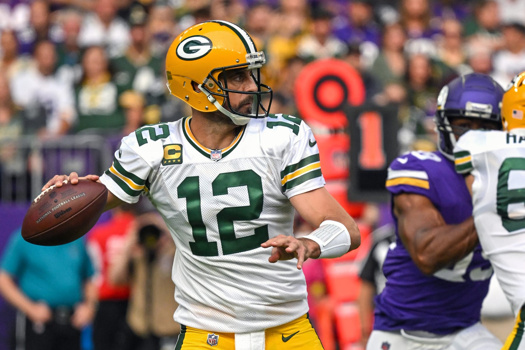 MINNEAPOLIS, MN - SEPTEMBER 11: Green Bay Packers quarterback Aaron Rodgers (12) makes a throw during the second quarter an NFL game between the Minnesota Vikings and Green Bay Packers on September 11, 2022 at U.S. Bank Stadium in Minneapolis, MN.(Photo by Nick Wosika/Icon Sportswire via Getty Images)