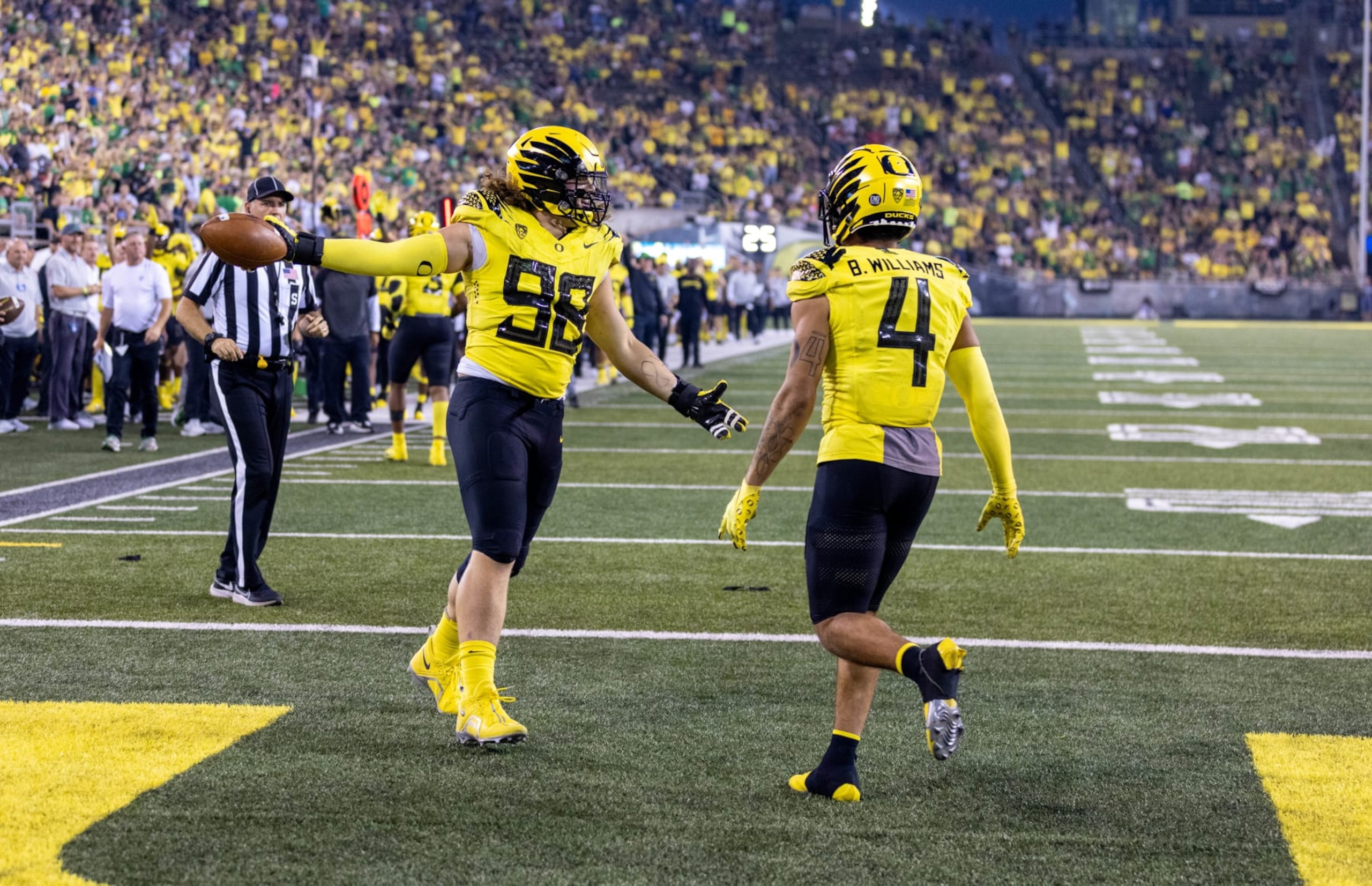 EUGENE, OR - SEPTEMBER 10: Casey Rogers #98 of the Oregon Ducks celebrates a defensive touchdown during the second half of the game against the Eastern Washington Eagles at Autzen Stadium on September 10, 2022 in Eugene, Oregon. (Photo by Tom Hauck/Getty Images)