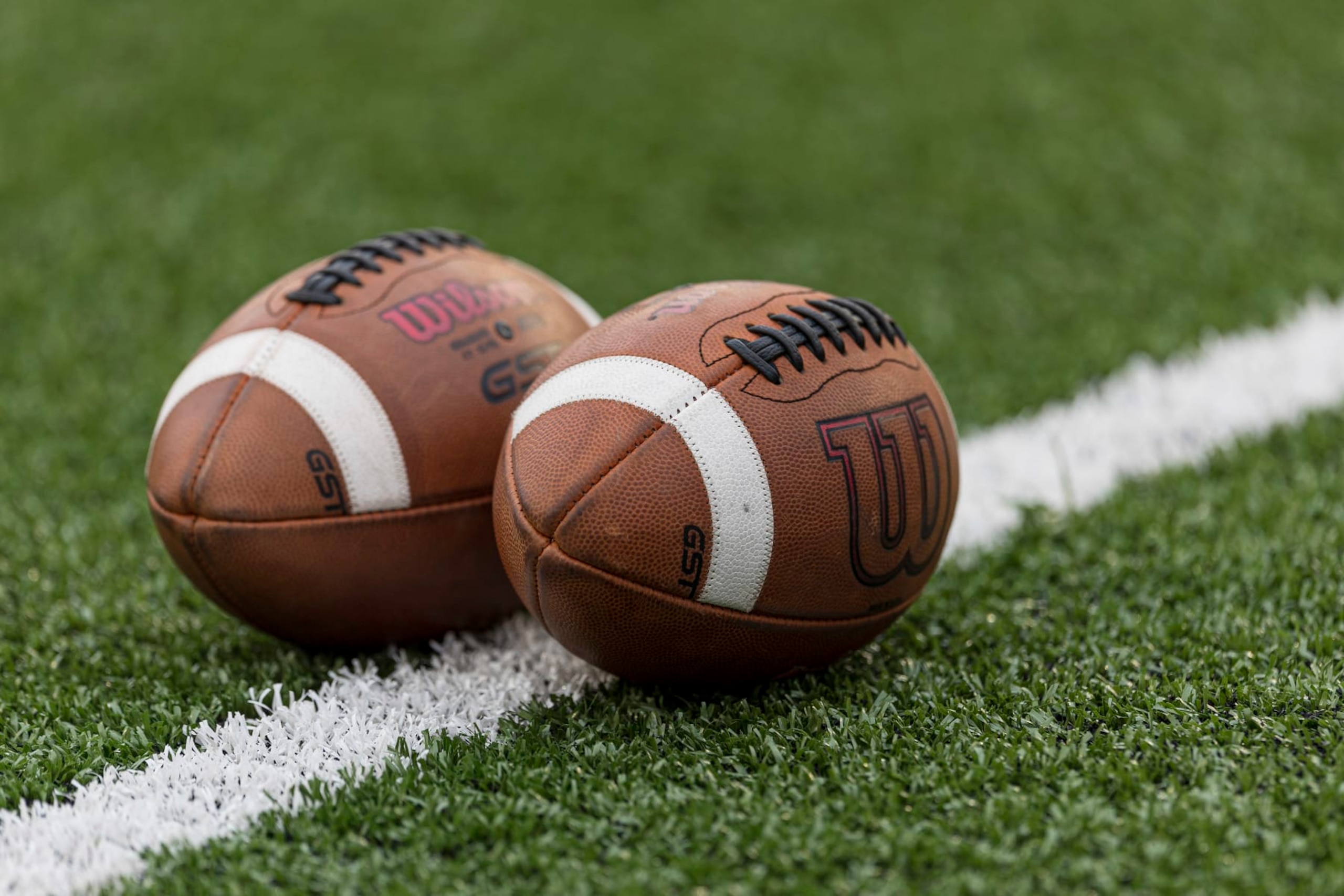 MADISON, WI - SEPTEMBER 03: Wilson footballs sit on the field prior to a college football game between the Illinois State Redbirds and the Wisconsin Badgers on September 3rd, 2022 at Barry Alvarez field in Camp Randall Stadium in Madison, WI. (Photo by Dan Sanger/Icon Sportswire via Getty Images)