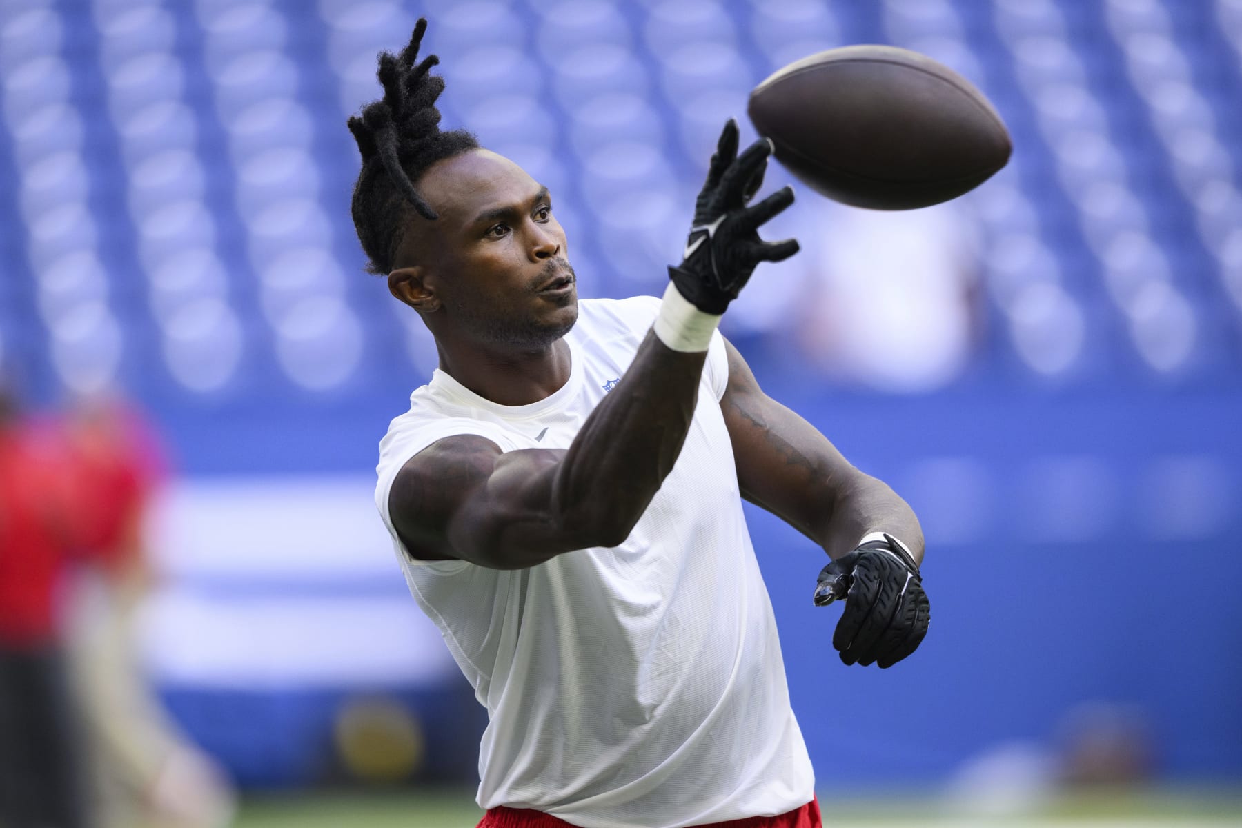 Tampa Bay Buccaneers wide receiver Julio Jones (85) warms up before an NFL football game against the Indianapolis Colts, Saturday, Aug. 27, 2022, in Indianapolis. (AP Photo/Zach Bolinger)