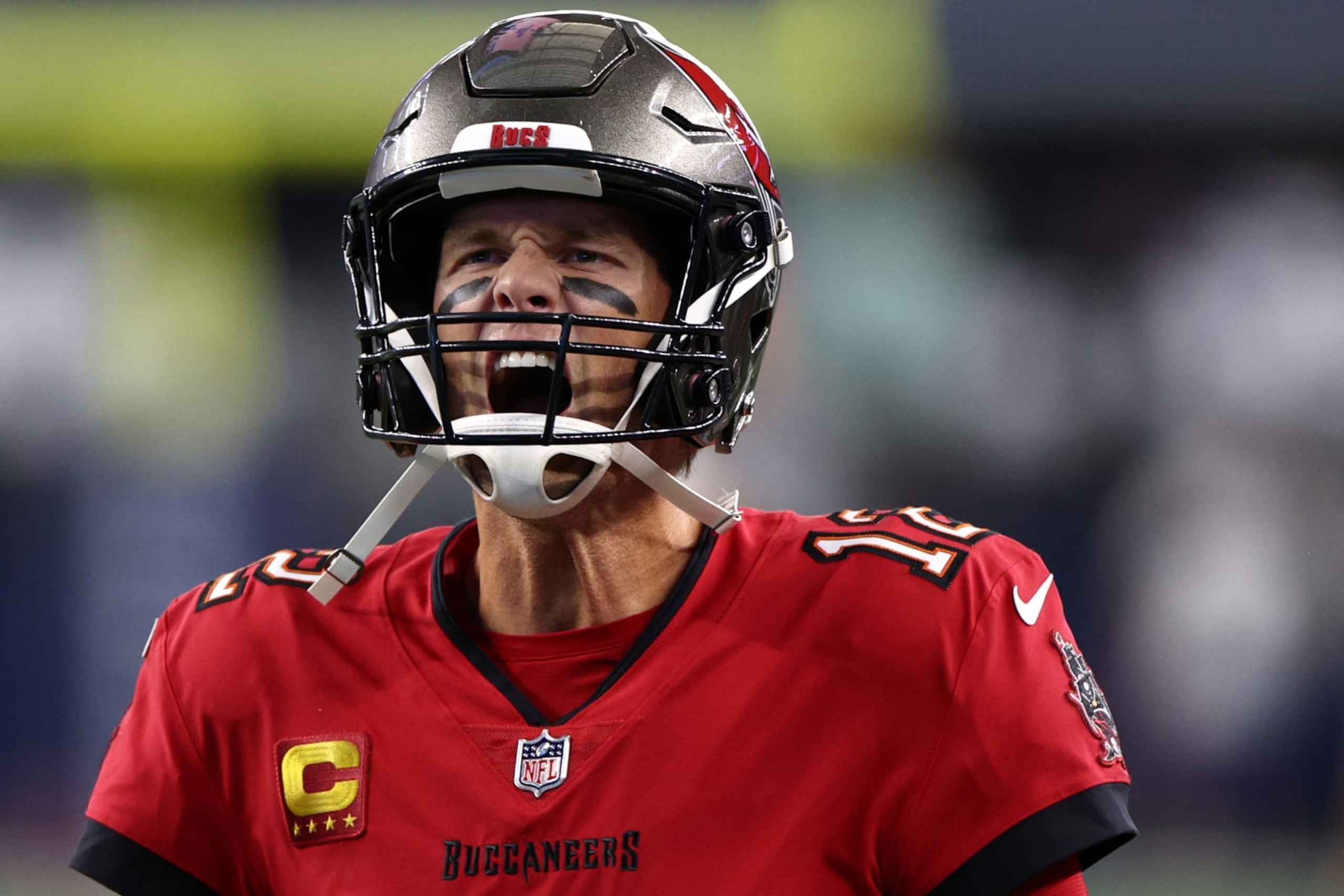 ARLINGTON, TEXAS - SEPTEMBER 11: Tom Brady #12 of the Tampa Bay Buccaneers yells as he takes the field before the game between the Tampa Bay Buccaneers and the Dallas Cowboys at AT&T Stadium on September 11, 2022 in Arlington, Texas. (Photo by Tom Pennington/Getty Images)