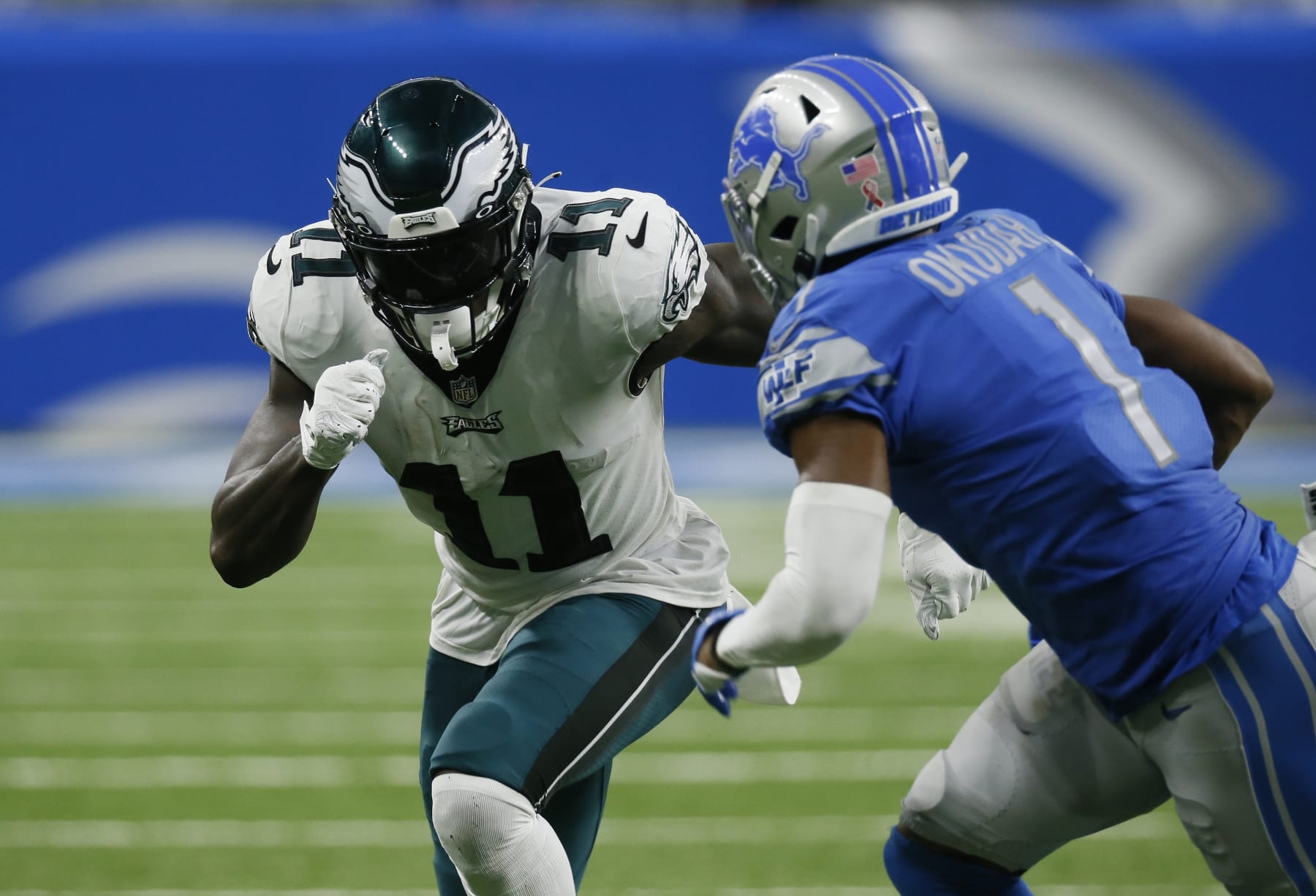 Philadelphia Eagles wide receiver A.J. Brown (11) runs a route against Detroit Lions cornerback Jeff Okudah (1) in the second half of an NFL football game in Detroit, Sunday, Sept. 11, 2022. (AP Photo/Duane Burleson)