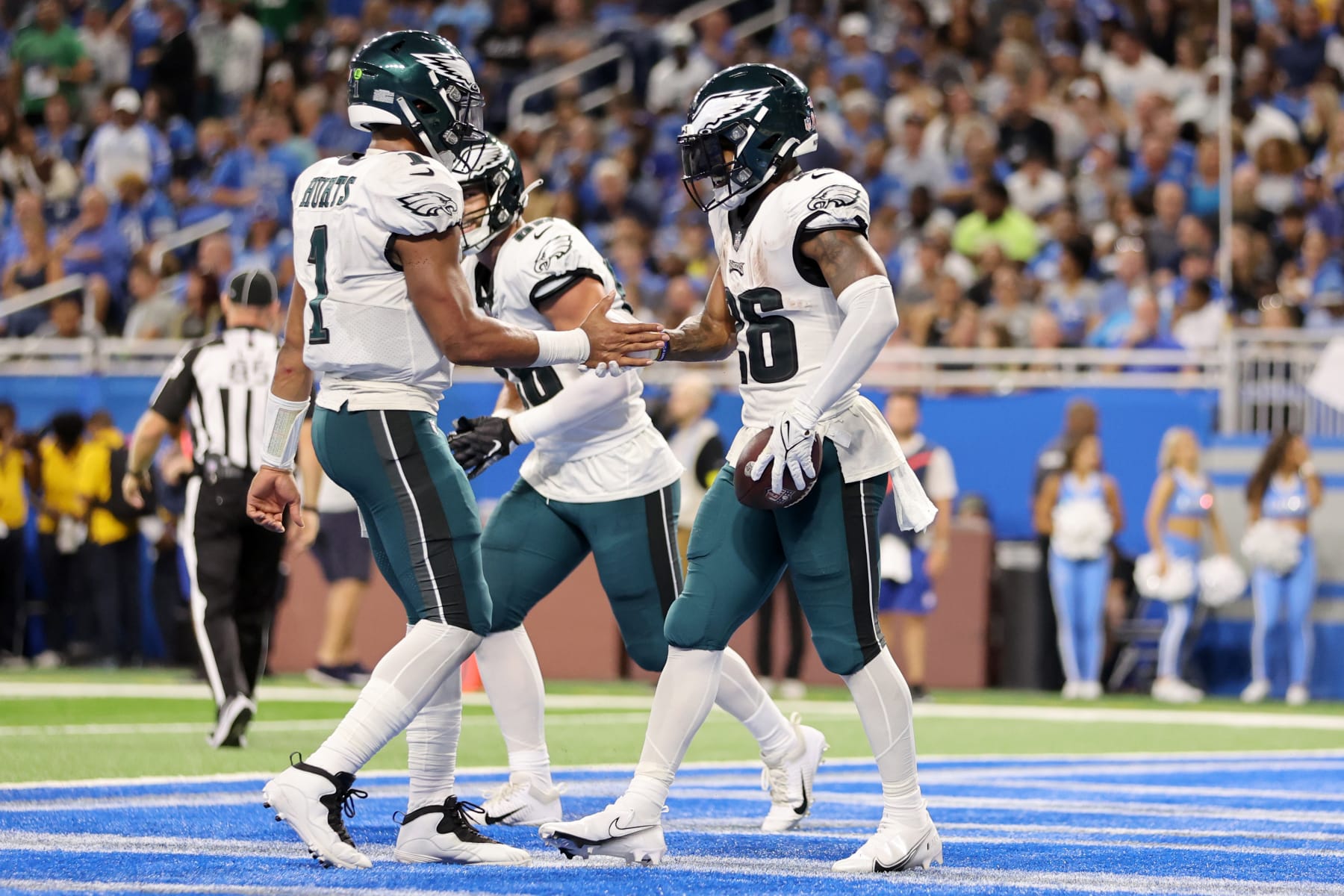DETROIT, MICHIGAN - SEPTEMBER 11: Miles Sanders #26 of the Philadelphia Eagles celebrates with Jalen Hurts #1 of the Philadelphia Eagles after scoring a touchdown in the second quarter of the game at Ford Field on September 11, 2022 in Detroit, Michigan. (Photo by Gregory Shamus/Getty Images)