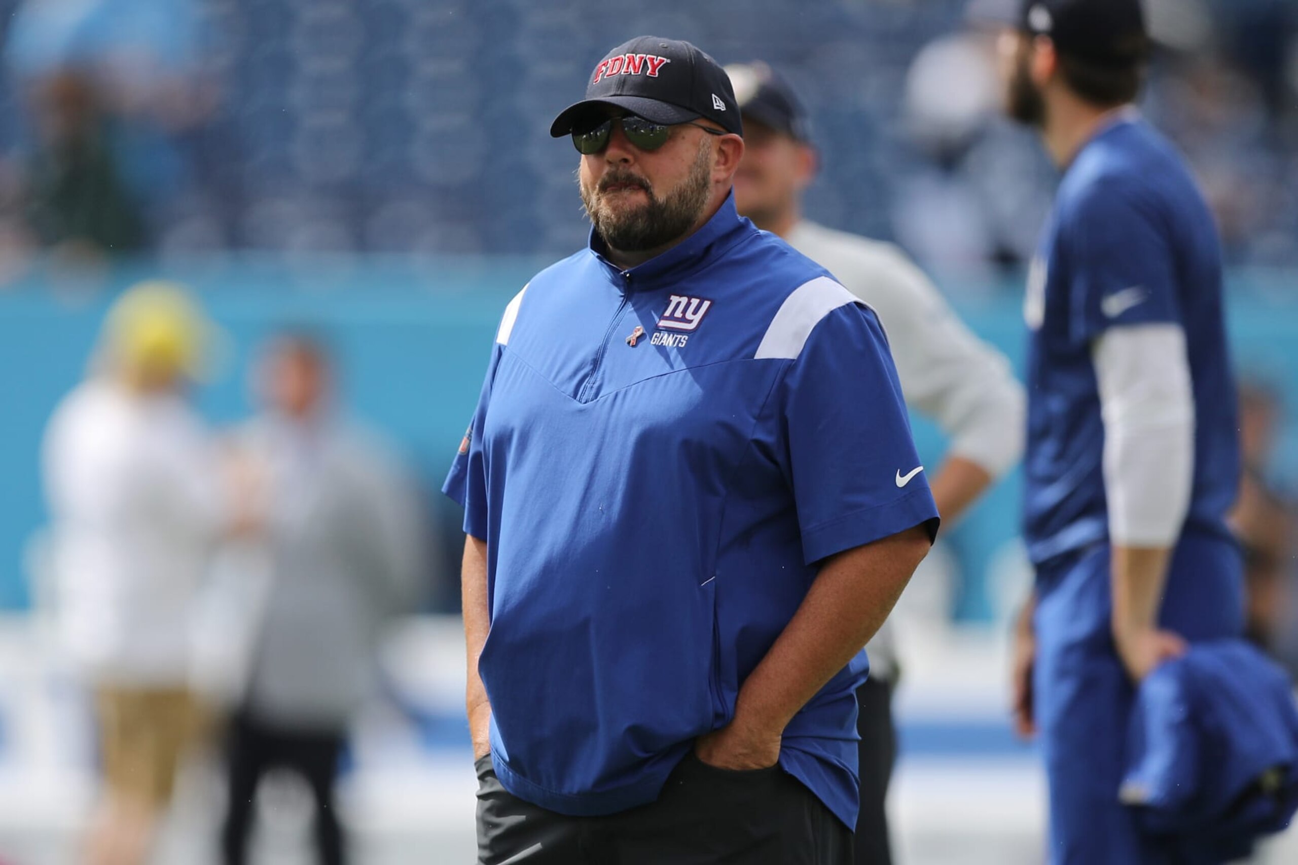 NASHVILLE, TENNESSEE - SEPTEMBER 11: Head coach Brian Daboll of the New York Giants looks onward during pregame against the Tennessee Titans at Nissan Stadium on September 11, 2022 in Nashville, Tennessee. (Photo by Justin Ford/Getty Images)