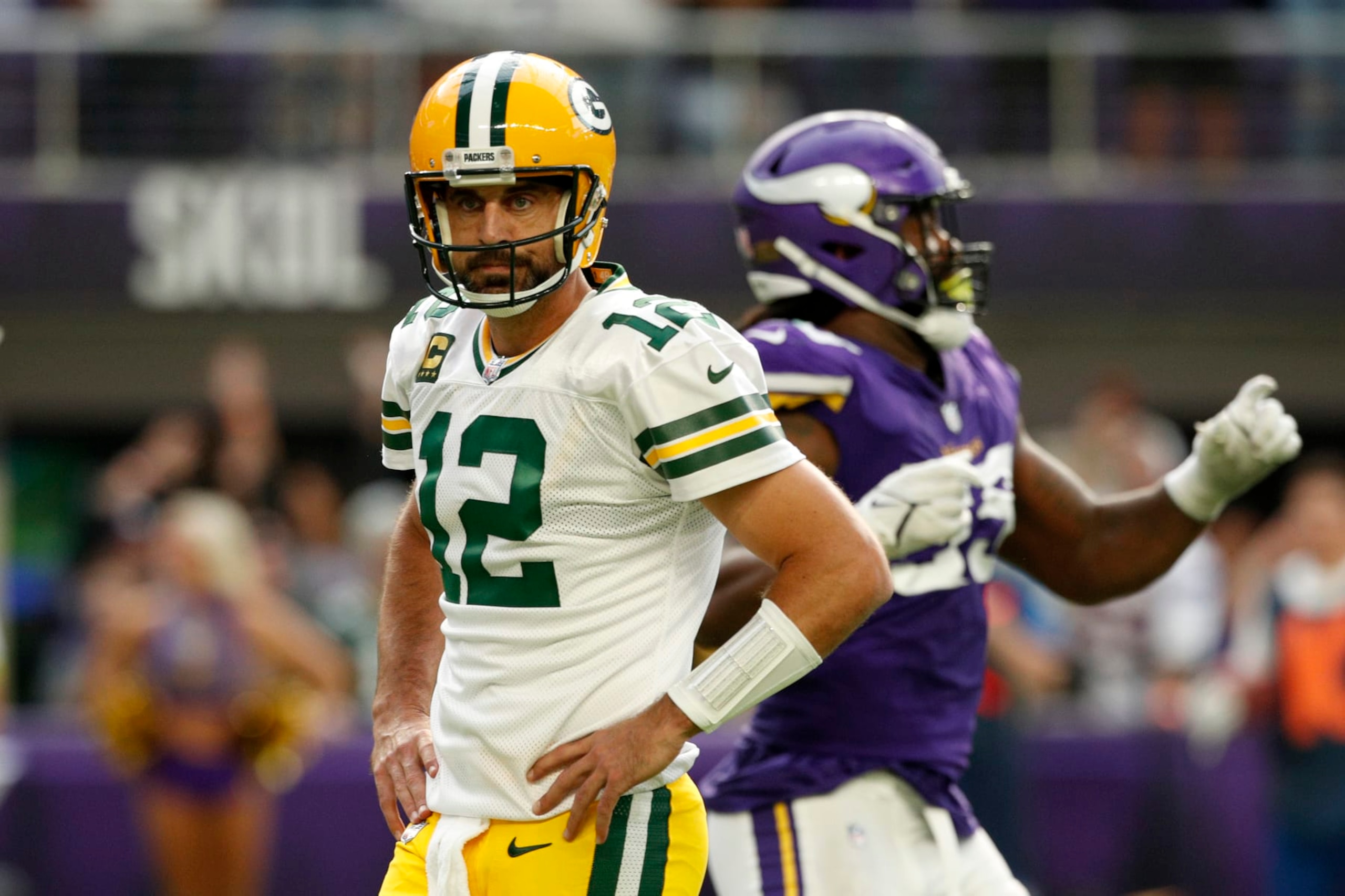 MINNEAPOLIS, MINNESOTA - SEPTEMBER 11: Aaron Rodgers #12 of the Green Bay Packers looks on during the second quarter in the game against the Minnesota Vikings at U.S. Bank Stadium on September 11, 2022 in Minneapolis, Minnesota. (Photo by David Berding/Getty Images) MINNEAPOLIS, MINNESOTA - SEPTEMBER 11: Aaron Rodgers #12 of the Green Bay Packers looks on during the second quarter in the game against the Minnesota Vikings at U.S. Bank Stadium on September 11, 2022 in Minneapolis, Minnesota. (Photo by David Berding/Getty Images)