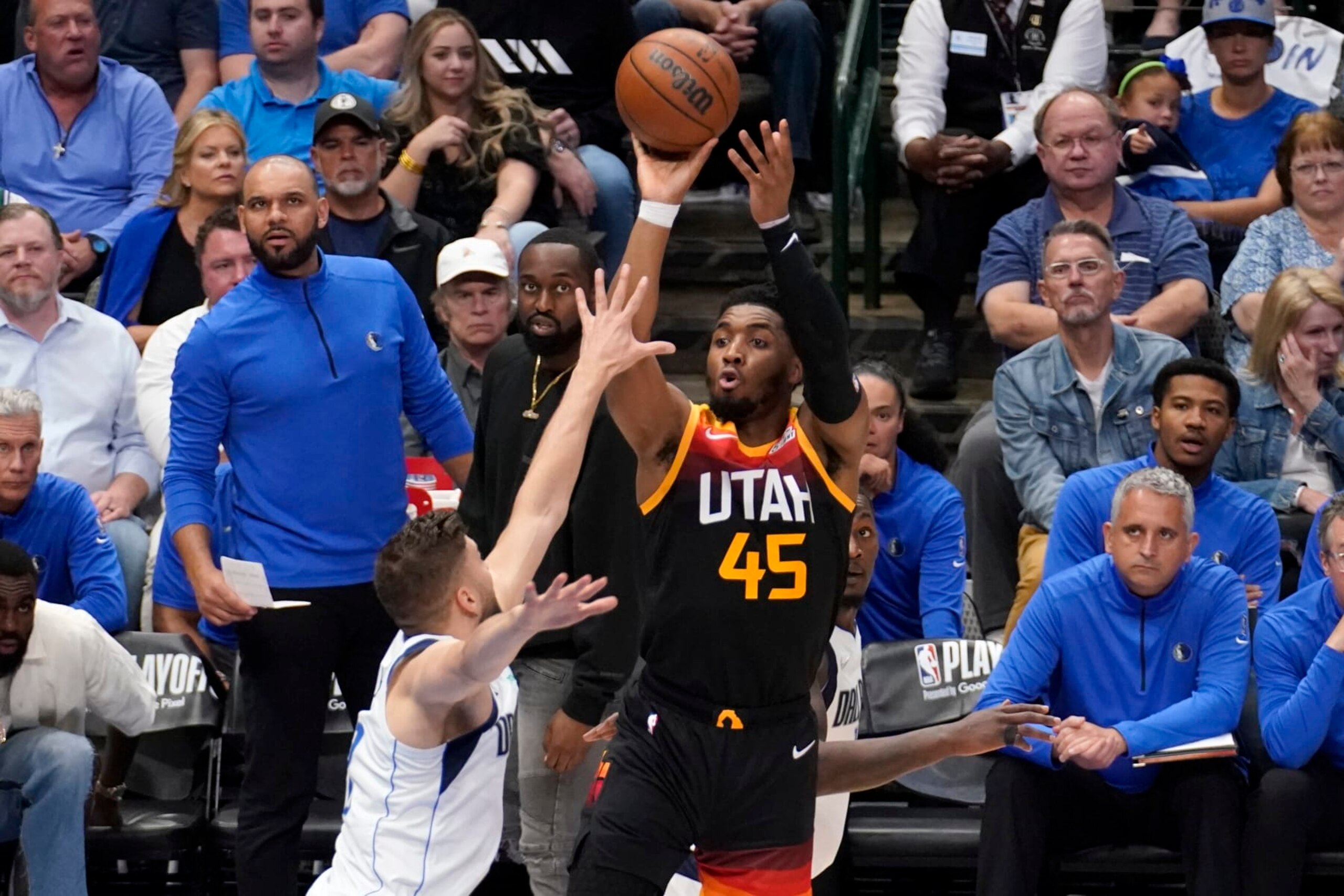Dallas Mavericks forward Maxi Kleber, left, defends as Utah Jazz guard Donovan Mitchell (45) attempts a 3-point basket in the first half of Game 2 of an NBA basketball first-round playoff series, Monday, April 18, 2022, in Dallas. (AP Photo/Tony Gutierrez) Dallas Mavericks forward Maxi Kleber, left, defends as Utah Jazz guard Donovan Mitchell (45) attempts a 3-point basket in the first half of Game 2 of an NBA basketball first-round playoff series, Monday, April 18, 2022, in Dallas. (AP Photo/Tony Gutierrez)