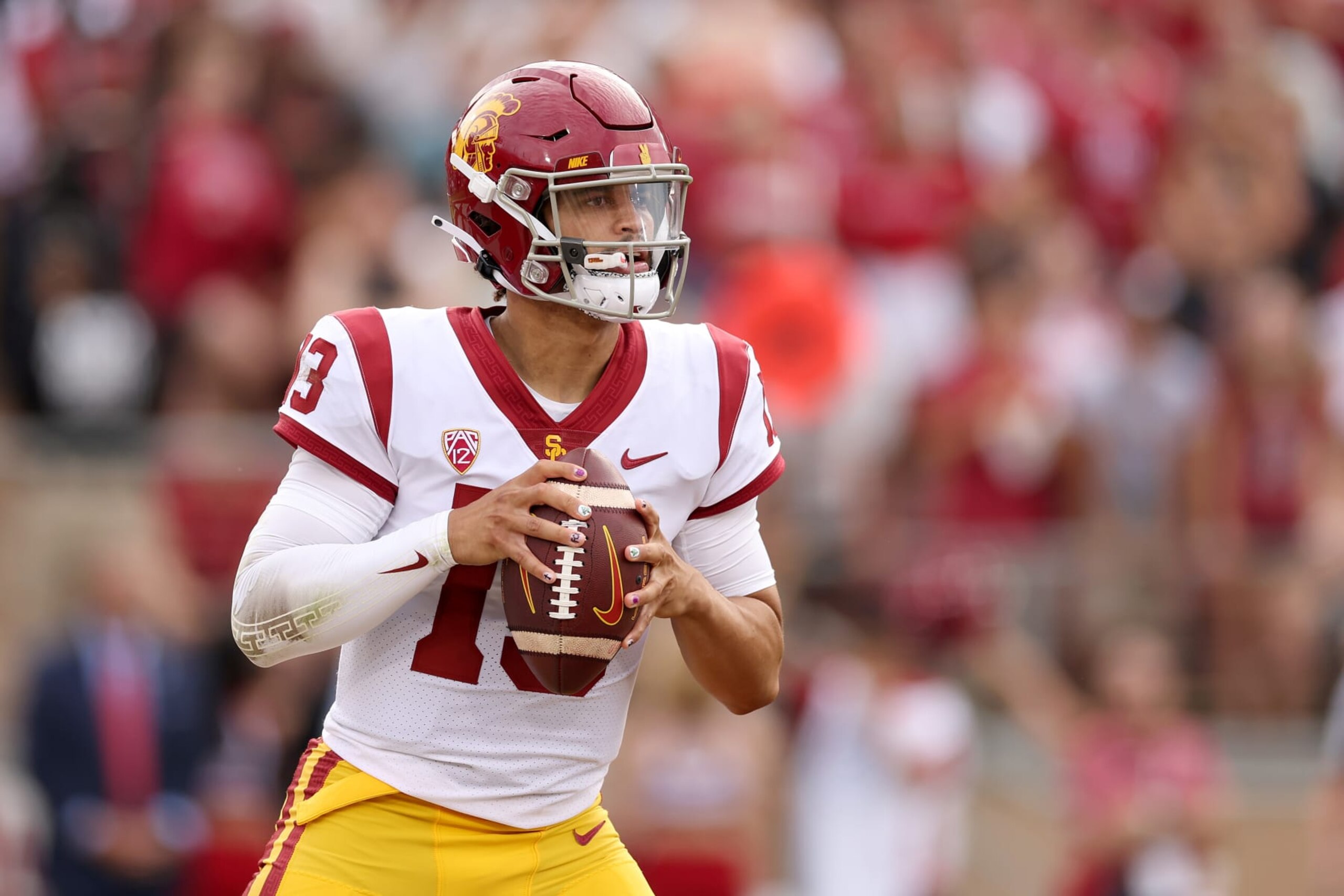 STANFORD, CALIFORNIA - SEPTEMBER 10: Caleb Williams #13 of the USC Trojans in action against the Stanford Cardinal at Stanford Stadium on September 10, 2022 in Stanford, California. (Photo by Ezra Shaw/Getty Images)