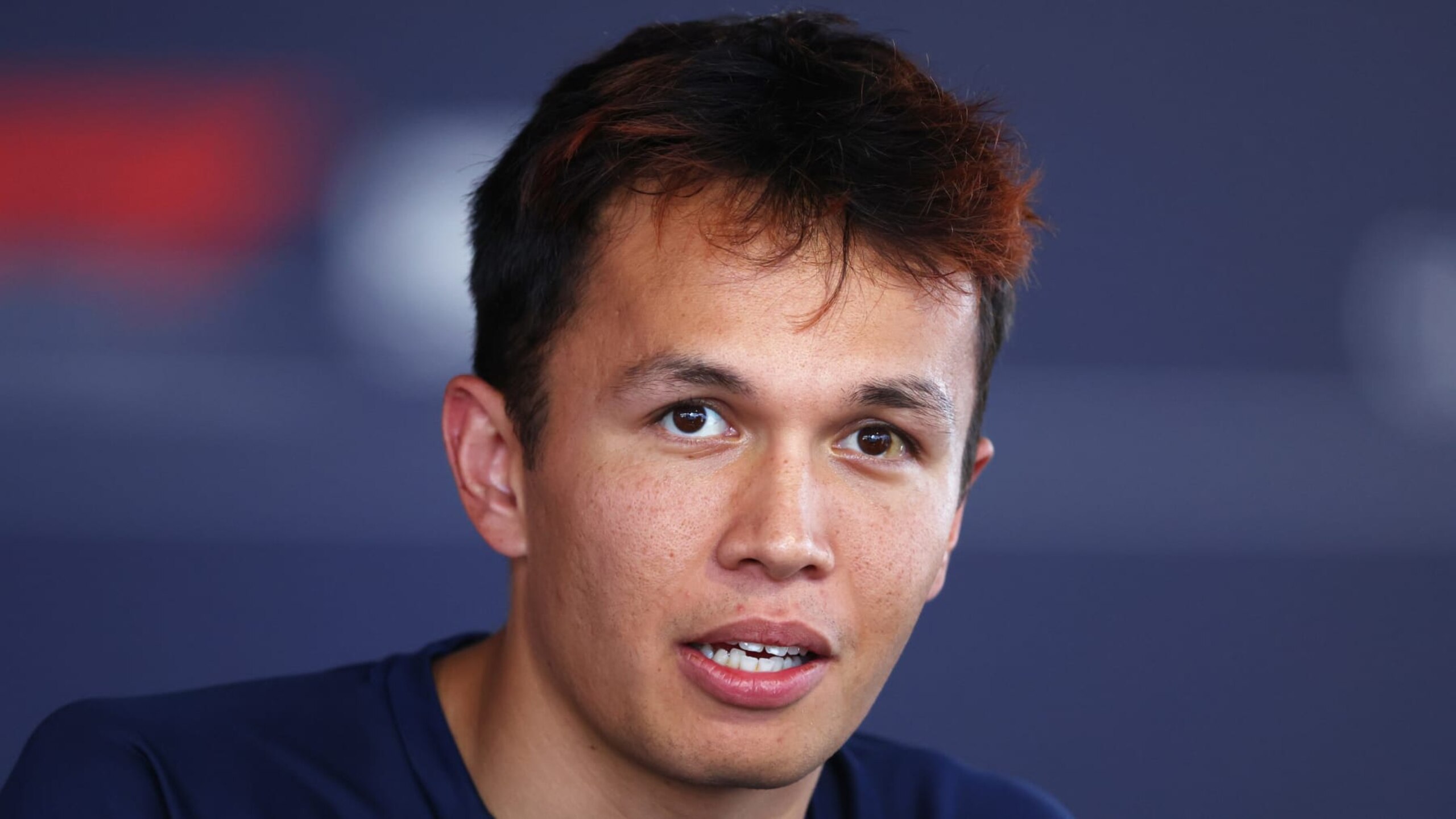 MONZA, ITALY - SEPTEMBER 08: Alexander Albon of Thailand and Williams talks to the media in the paddock during previews ahead of the F1 Grand Prix of Italy at Autodromo Nazionale Monza on September 08, 2022 in Monza, Italy. (Photo by Bryn Lennon - Formula 1/Formula 1 via Getty Images)