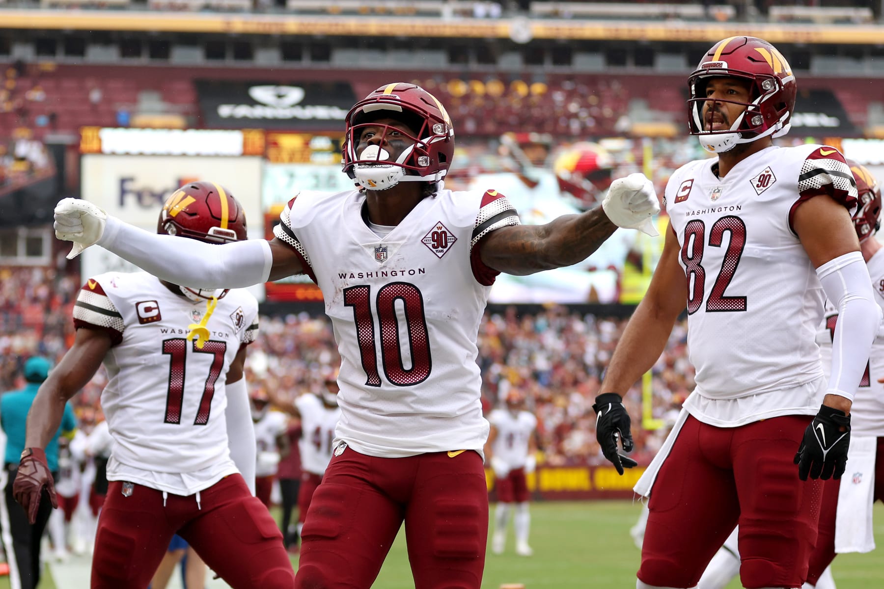 LANDOVER, MARYLAND - SEPTEMBER 11: Curtis Samuel #10 of the Washington Commanders celebrates scoring a receiving touchdown during the first quarter against the Jacksonville Jaguars at FedExField on September 11, 2022 in Landover, Maryland. (Photo by Patrick Smith/Getty Images)