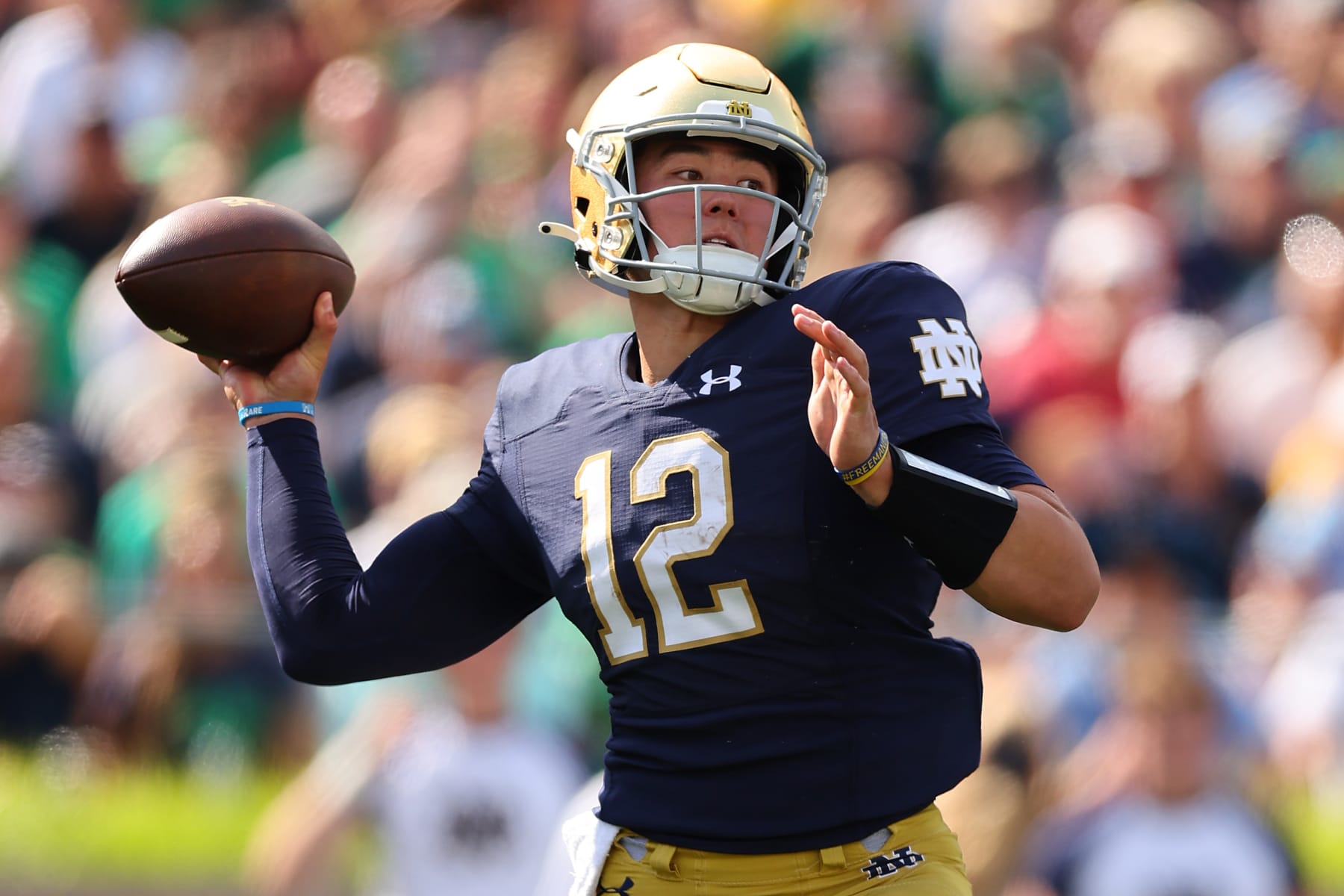 SOUTH BEND, INDIANA - SEPTEMBER 10: Tyler Buchner #12 of the Notre Dame Fighting Irish throws a pass against the Marshall Thundering Herd during the first half at Notre Dame Stadium on September 10, 2022 in South Bend, Indiana. (Photo by Michael Reaves/Getty Images)
