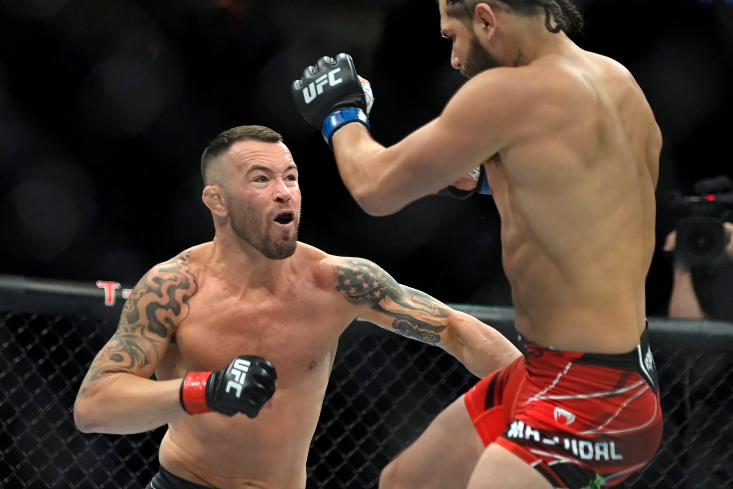LAS VEGAS, NEVADA - MARCH 05: Colby Covington (L) and Jorge Masvidal battle in their welterweight fight during UFC 272 at T-Mobile Arena on March 05, 2022 in Las Vegas, Nevada. (Photo by David Becker/Getty Images)