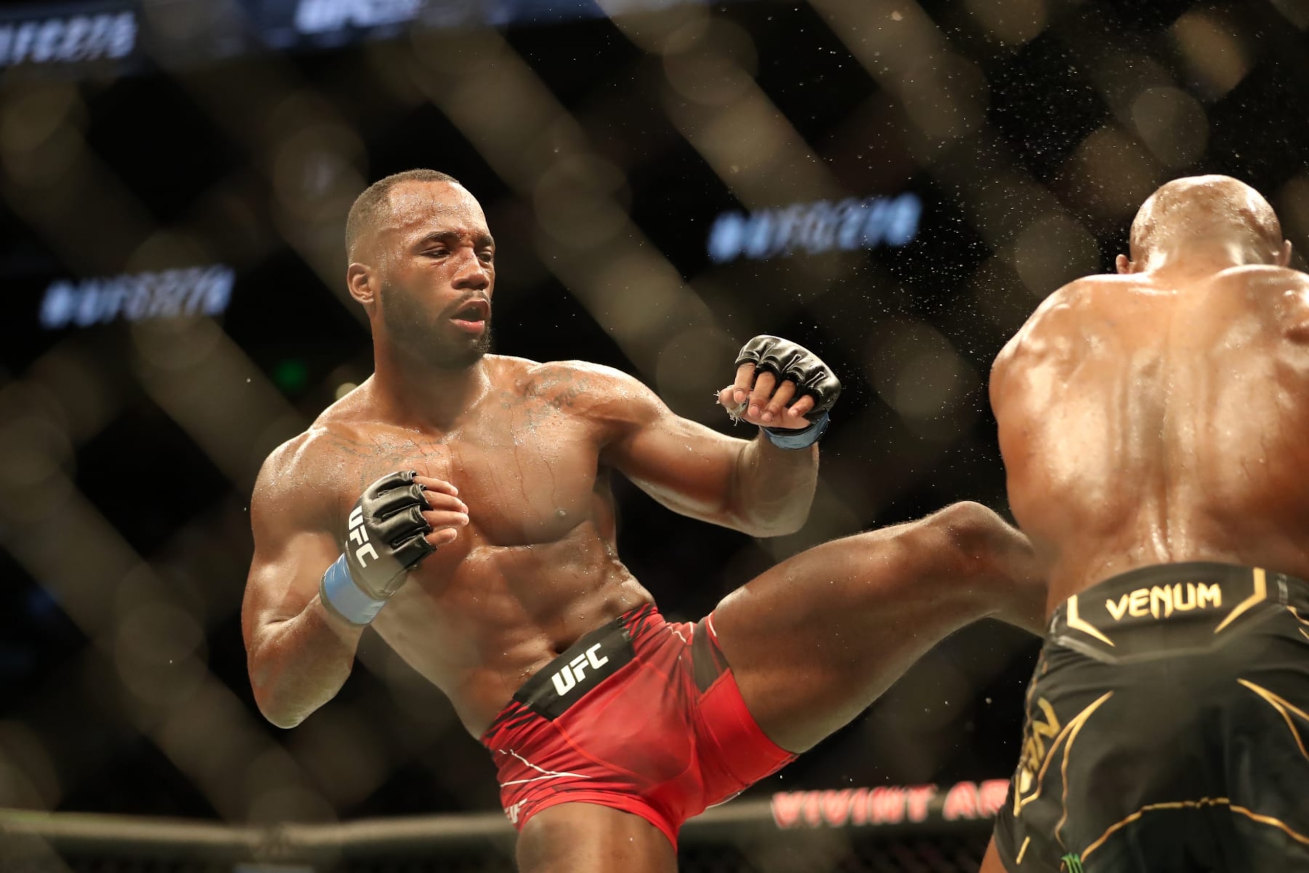 SALT LAKE CITY, UT - AUGUST 20: (L-R) Leon Edwards kicks Kamaru Usman in their Welterweight title bout during the UFC 278 at the Vivint Arena on August 20, 2022 in Salt Lake City, Utah, United States.
(Photo by Alejandro Salazar/PxImages/Icon Sportswire via Getty Images)