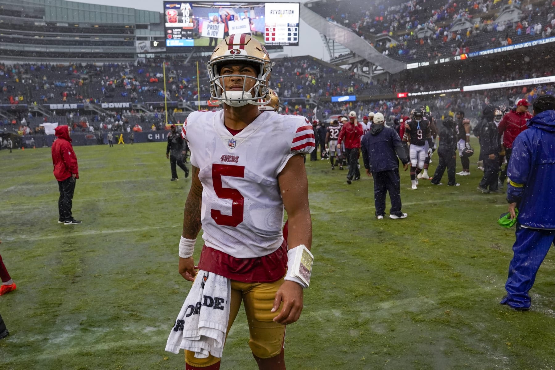 San Francisco 49ers' Trey Lance walks off the field after an NFL football game against the Chicago Bears Sunday, Sept. 11, 2022, in Chicago. The Bears won 19-10. (AP Photo/Charles Rex Arbogast)