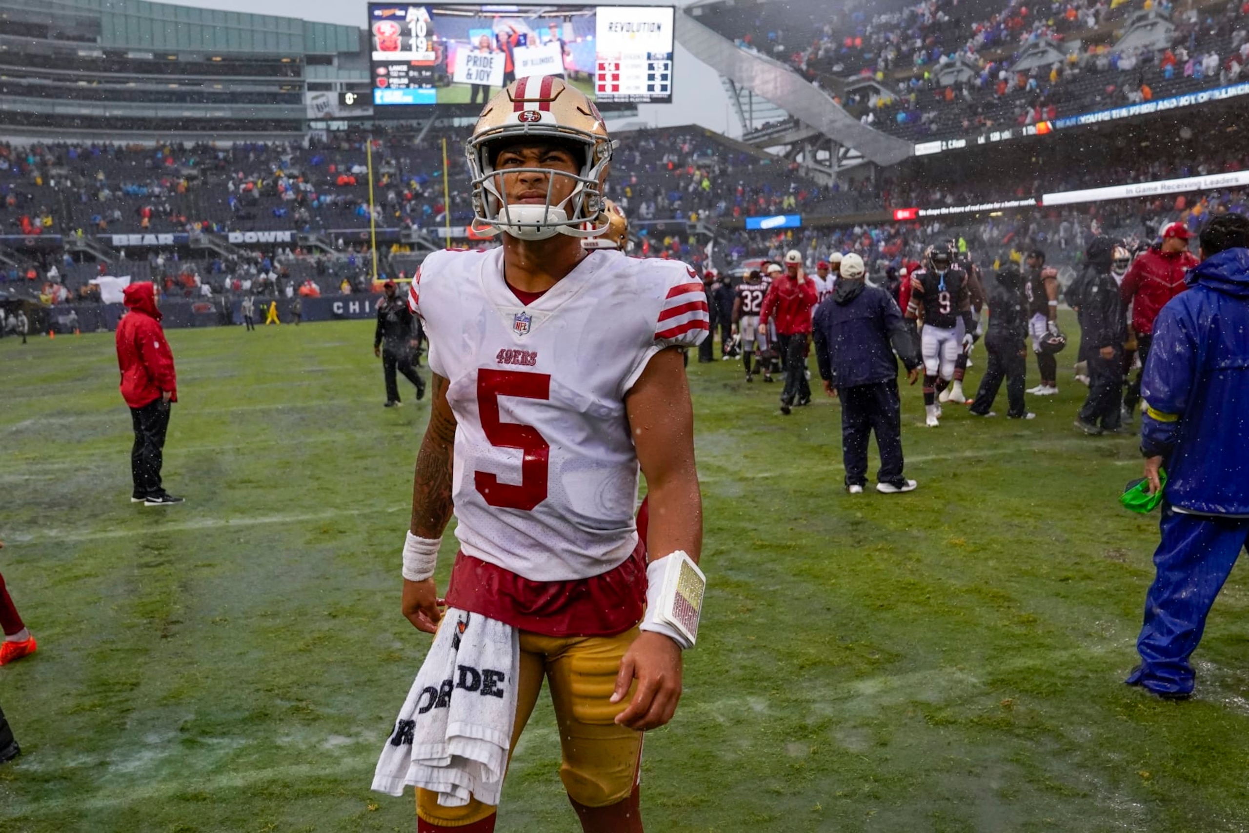San Francisco 49ers' Trey Lance walks off the field after an NFL football game against the Chicago Bears Sunday, Sept. 11, 2022, in Chicago. The Bears won 19-10. (AP Photo/Charles Rex Arbogast)